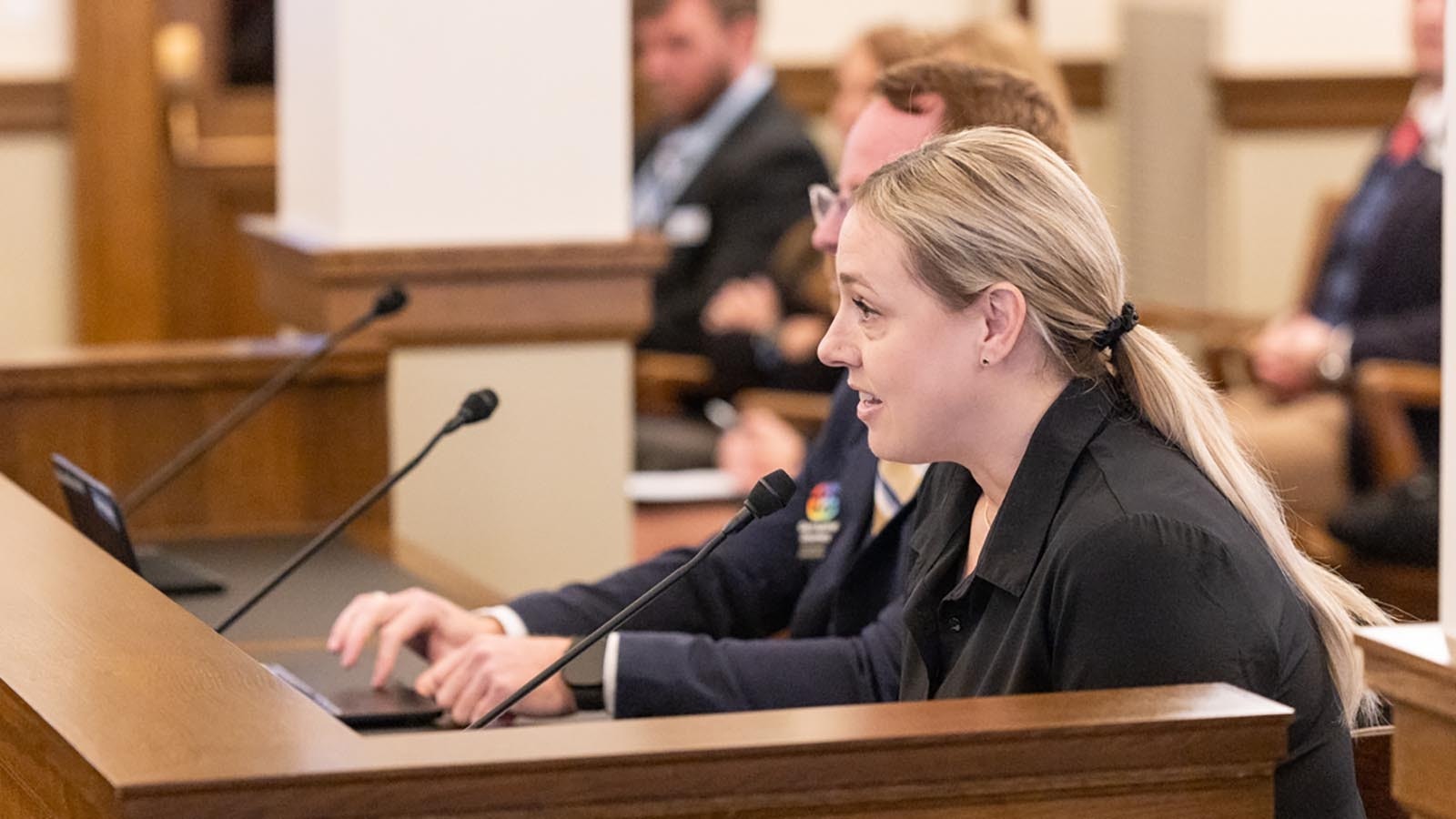 Colorado resident Erin Lee urges the Senate Education Committee to pass Senate File 44, which would extend Wyoming's transgender sports ban to the college level.