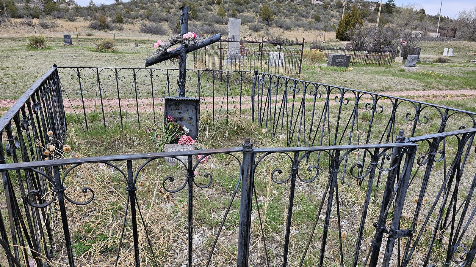 The grave of Riccardo Severini in Hartville, Wyoming. The fence was made by a family member who had been a blacksmith in Italy.