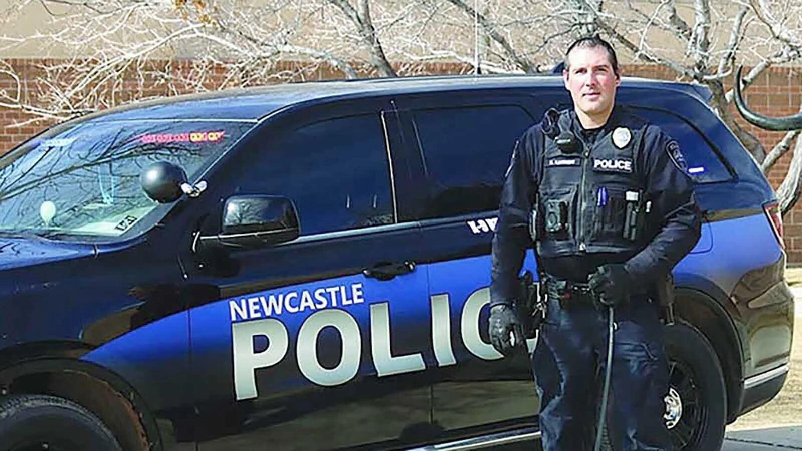 A suspended Newcastle police sergeant pleaded not guilty Thursday to charges alleging a yearlong pattern of abuse toward a woman including threatening her with a knife if she refused to get into his patrol vehicle.