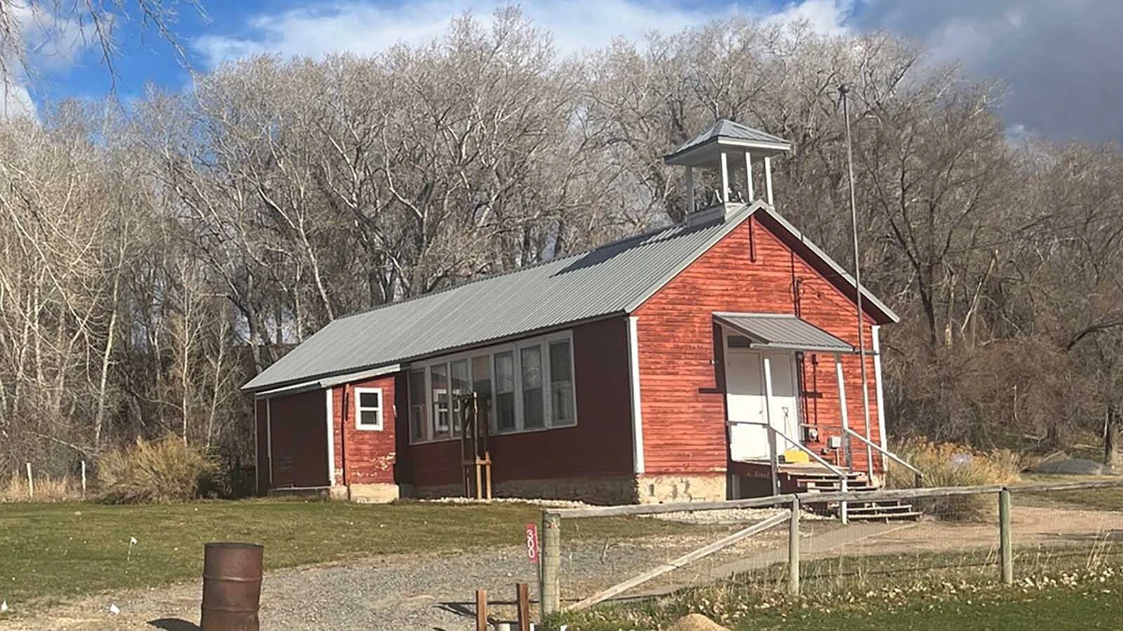 Volunteers have revived the historic Red Shell School, once featured on the cover of national textbooks, turning it into a vacation rental, museum, and community hub.