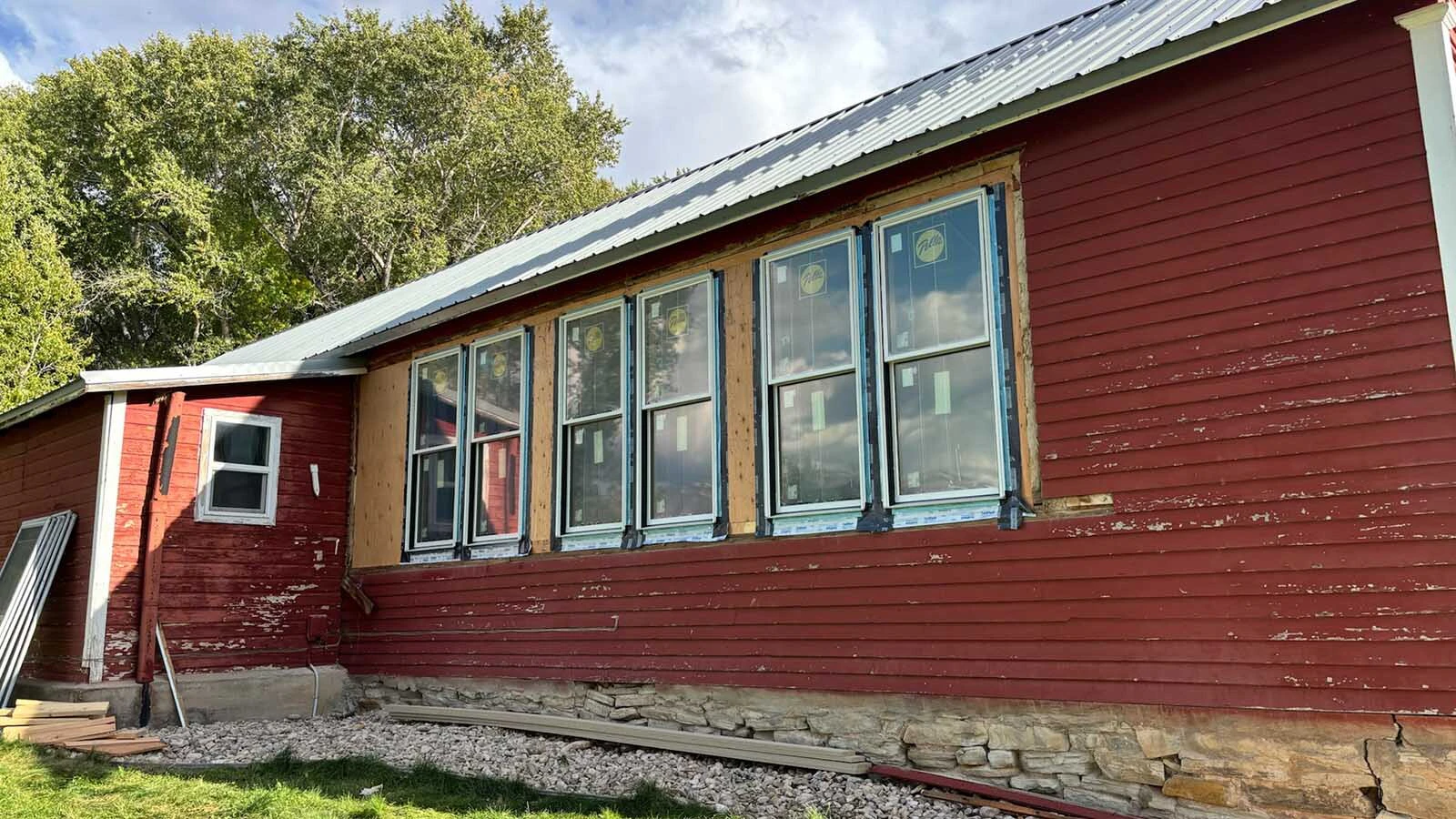 Volunteers have revived the historic Red Shell School, once featured on the cover of national textbooks, turning it into a vacation rental, museum, and community hub.