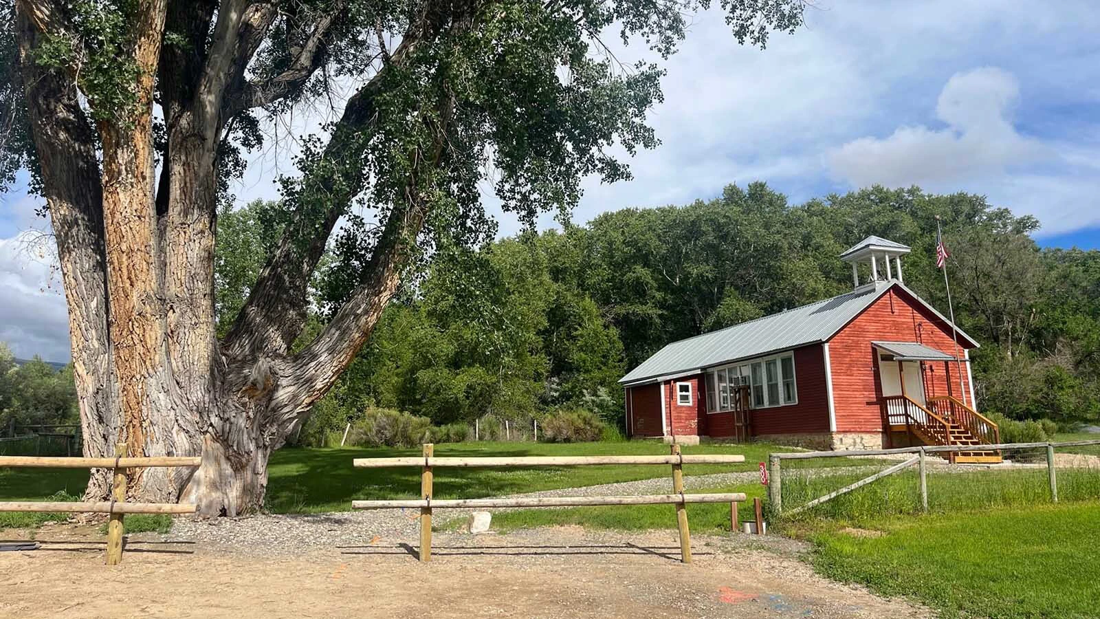 Volunteers have revived the historic Red Shell School, once featured on the cover of national textbooks, turning it into a vacation rental, museum, and community hub.
