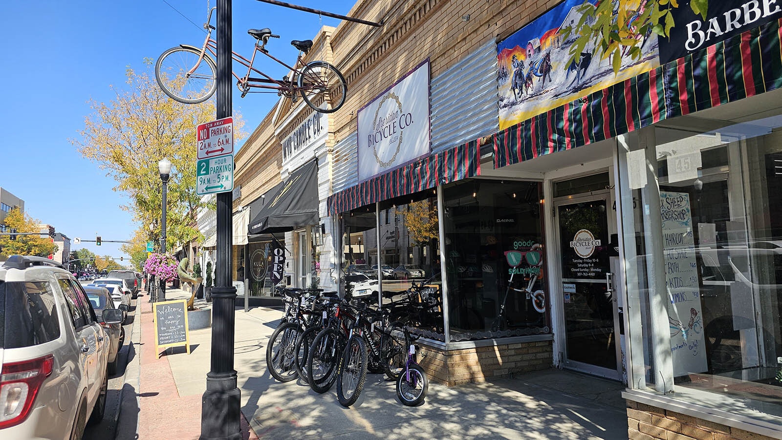 A barbershop next to a bike shop next to a candle store next to a fine art gallery. The diversity is part of what makes Sheridan's Main Street one of the best in the West.