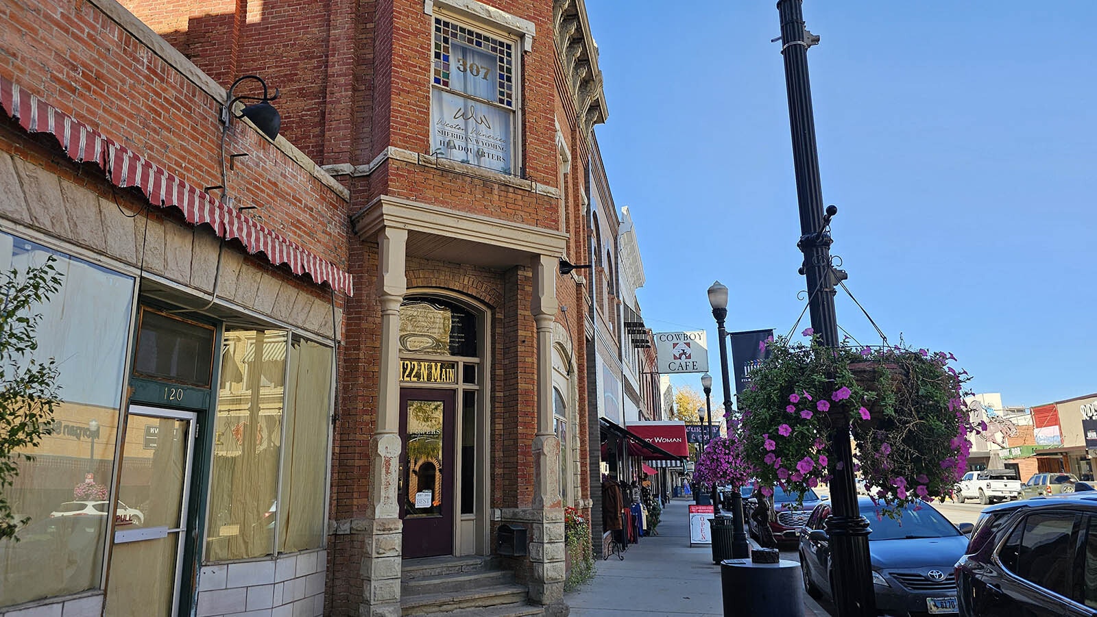 Local civic organizations raise money to place hanging baskets along Sheridan's Main Street, adding to its charms.