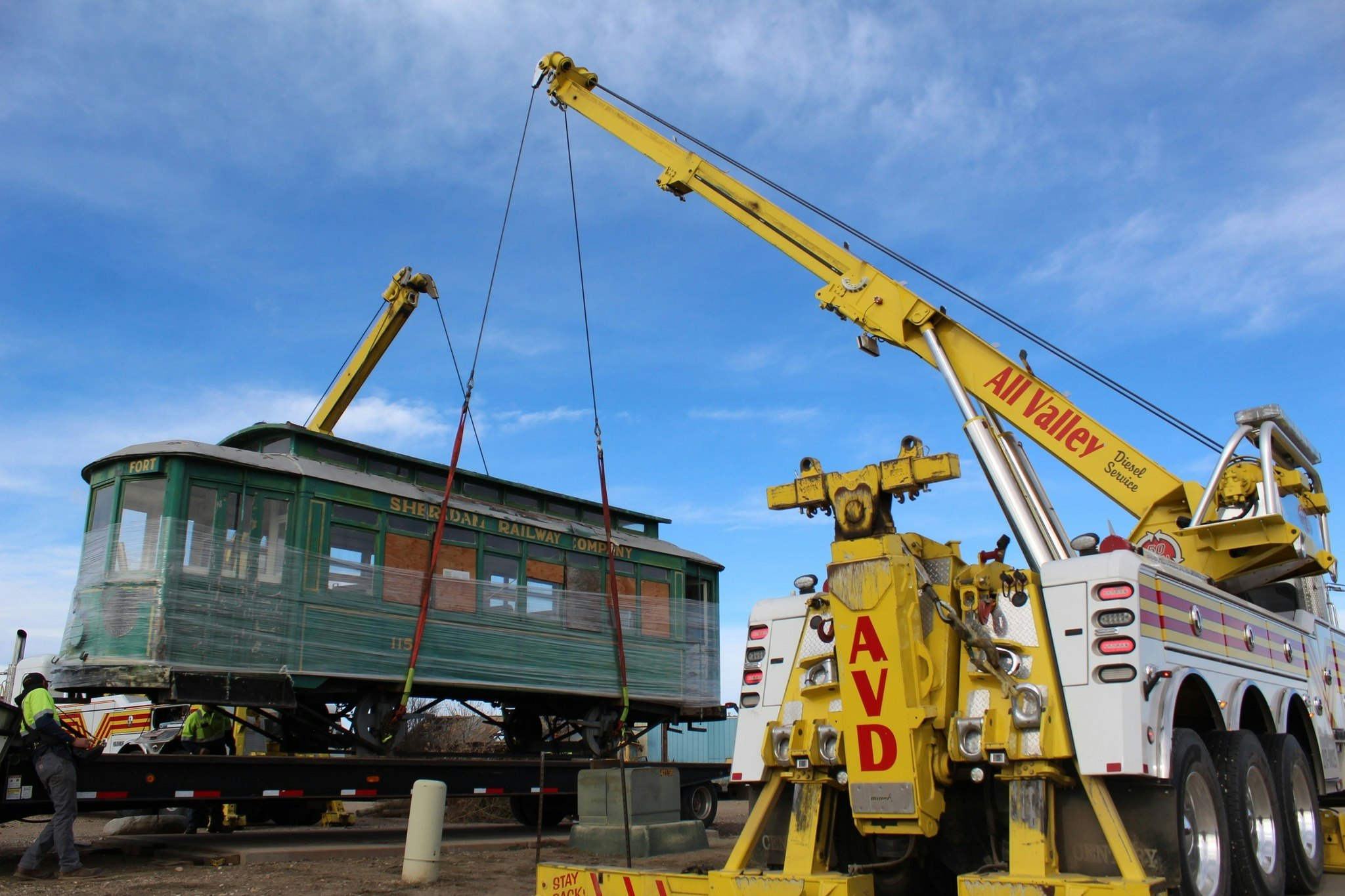 "Ol' 115," a streetcar that ran through Sheridan in the 1920s, made its final trip through town to the Sheridan Community Land Trust's headquarters. The historic streetcar will be restored and used an outdoor educational display.