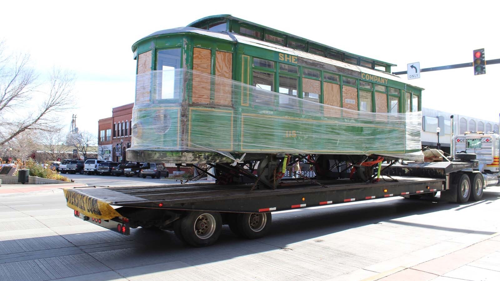 "Ol' 115," a streetcar that ran through Sheridan in the 1920s, made its final trip through town to the Sheridan Community Land Trust's headquarters. The historic streetcar will be restored and used an outdoor educational display.