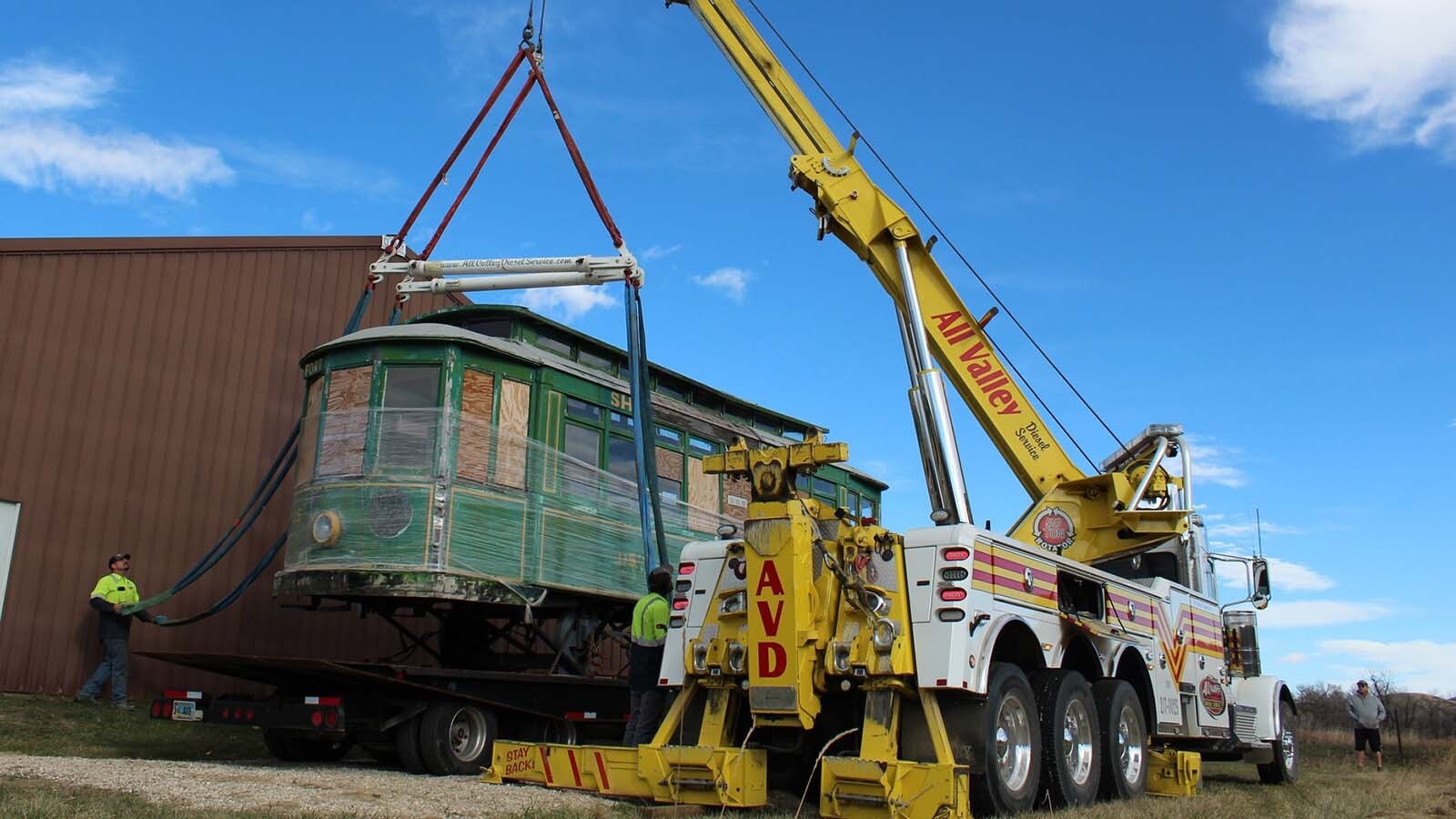 "Ol' 115," a streetcar that ran through Sheridan in the 1920s, made its final trip through town to the Sheridan Community Land Trust's headquarters. The historic streetcar will be restored and used an outdoor educational display.