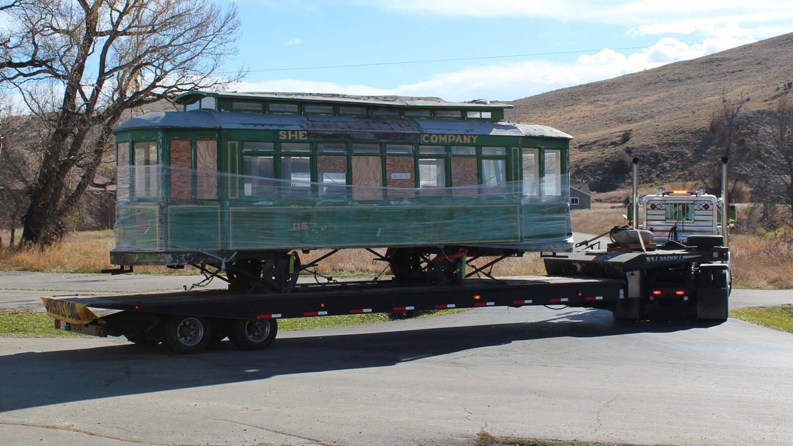 "Ol' 115," a streetcar that ran through Sheridan in the 1920s, made its final trip through town to the Sheridan Community Land Trust's headquarters. The historic streetcar will be restored and used an outdoor educational display.