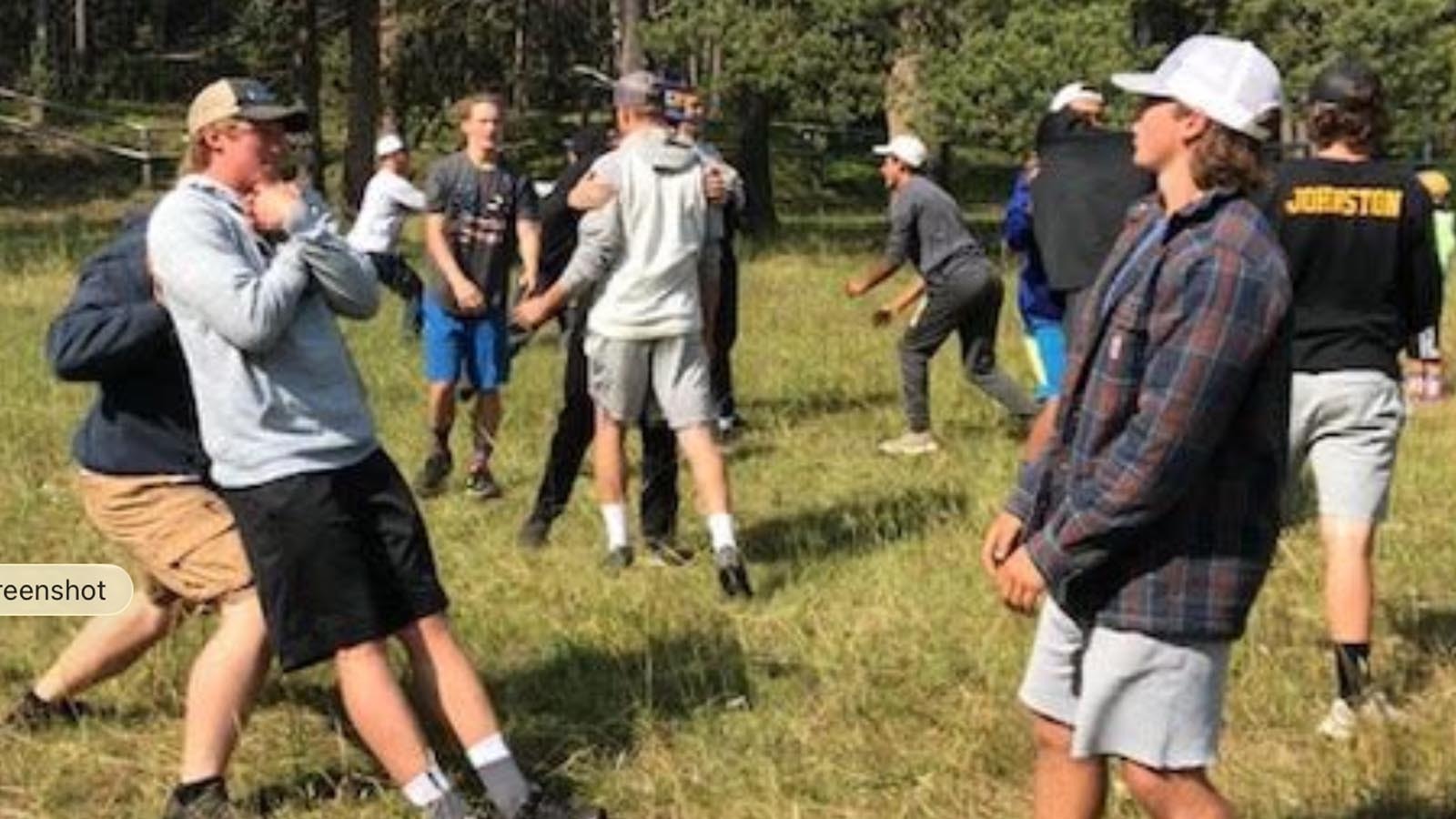 This year’s undefeated football championship run by the Sheridan Broncs was business as usual since former Head Coach Don Julian started a winning tradition current Head Coach Jeff Mowry continues. The secret to their success? Building leadership skills during retreats in the woods. A program describing the retreats includes photos of trust exercises and the team circled up for prayer.