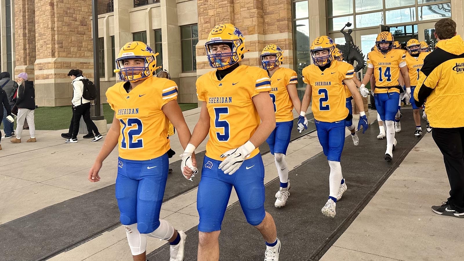 The Sheridan Broncs walk out on War Memorial Field before their 4A championship game Nov. 16, 2024.