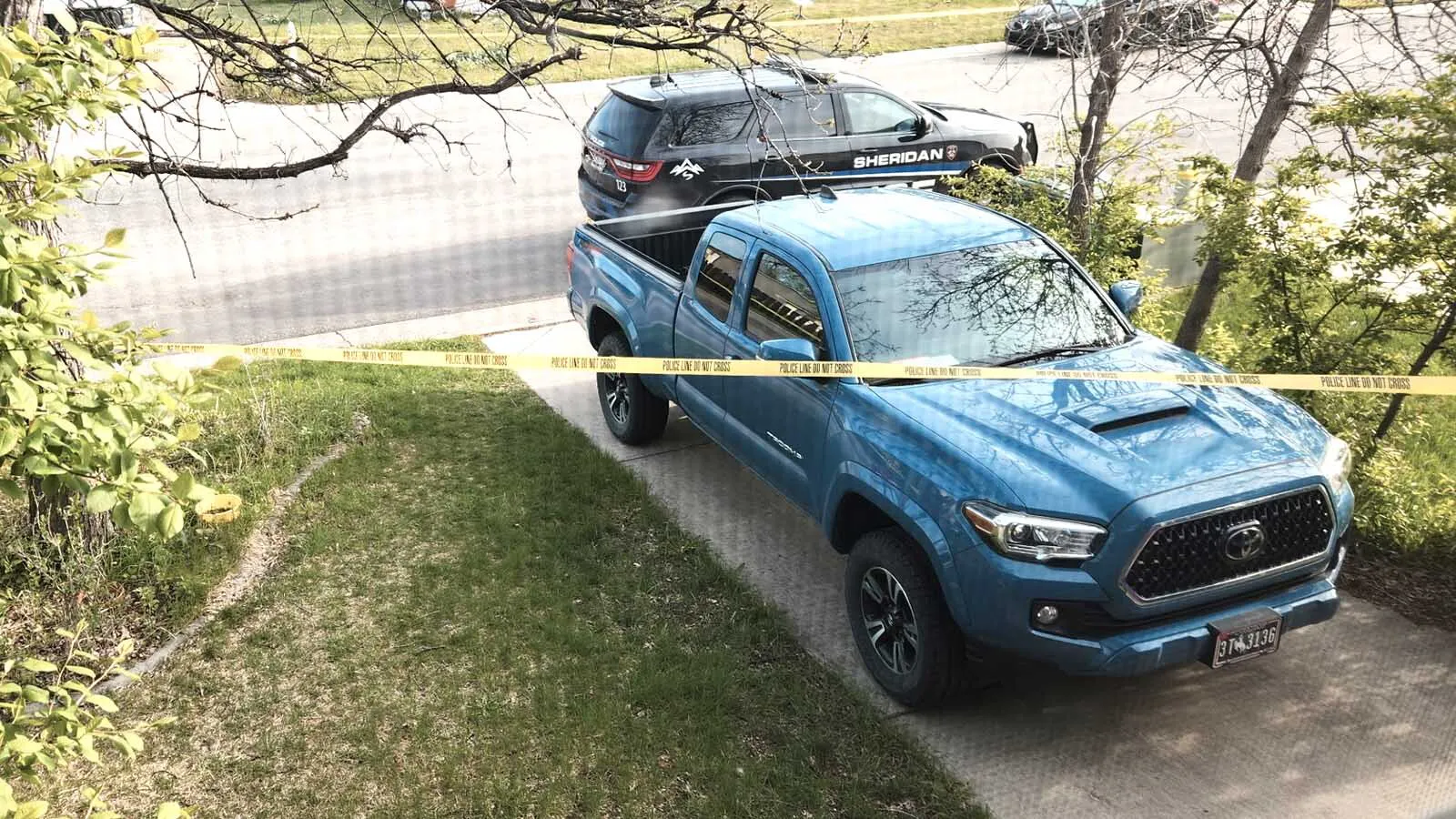 A frantic woman went from house to house pleading for help early Sunday morning, telling them her husband “has a gun." A neighbor said Monday that the man "sprayed" police cars with gunshots for around 20 minutes before being shot and hospitalized.