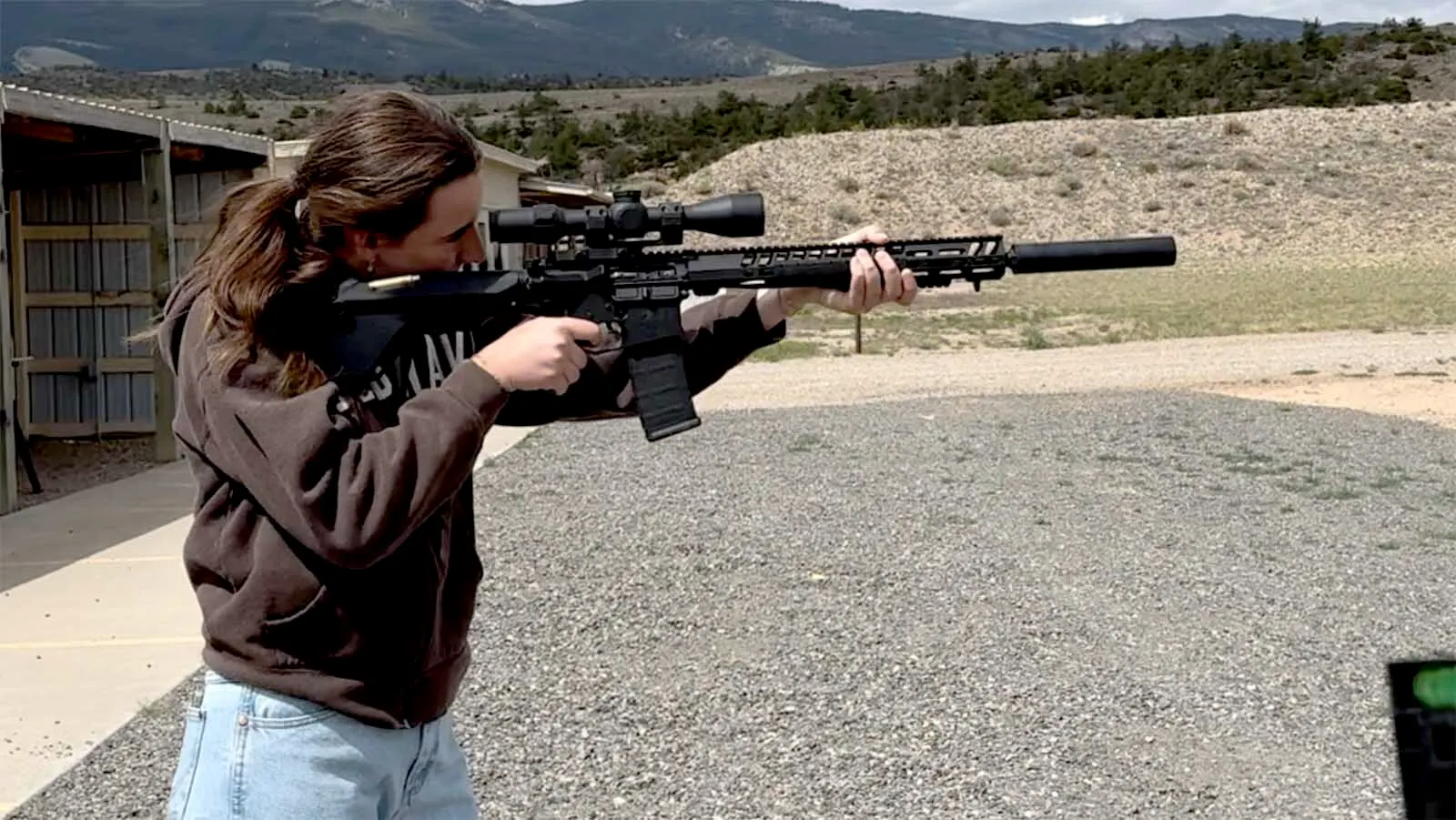 A customer at Wyoming Tactical Firearms shoots an AR-15 rifle. The U.S. Supreme Court will consider overturing bans on such rifles in other states.