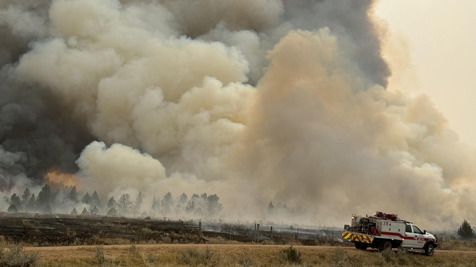 Smoke billows up from the Short Draw Fire burning about 30 miles north of Gillette in northern Wyoming and southern Montana.