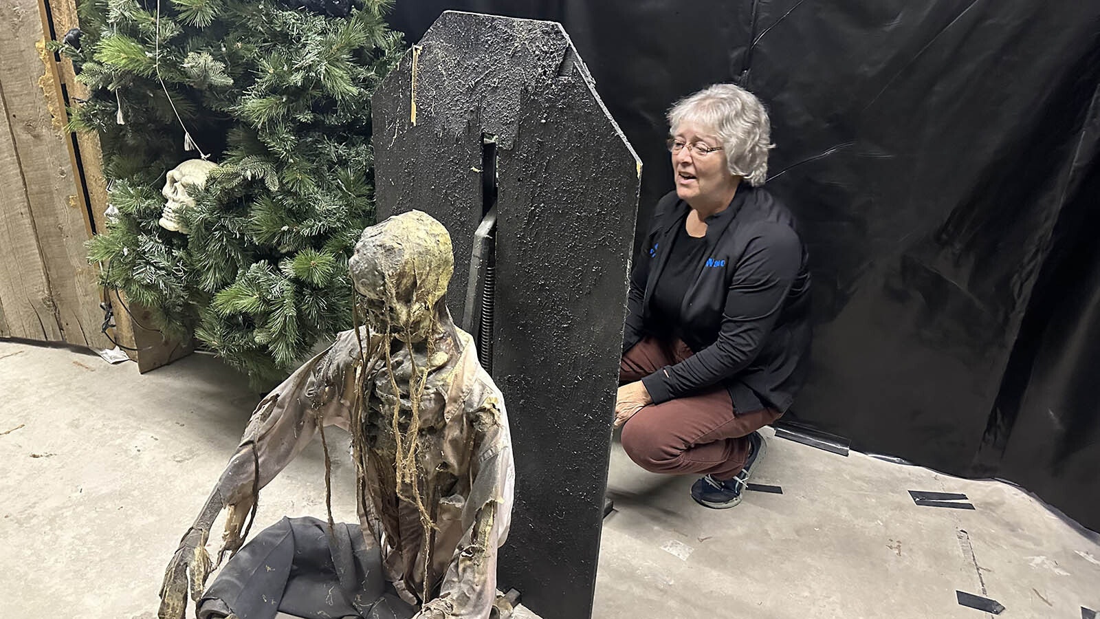 Wanda Weisz demonstrates a favorite prop at the Shoshoni Haunted House. She has scared people with this skeleton even in broad daylight.