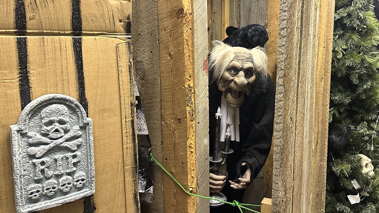 An outhouse prop from a homecoming parade is now the home of a ghoul at the Shoshoni Haunted House.