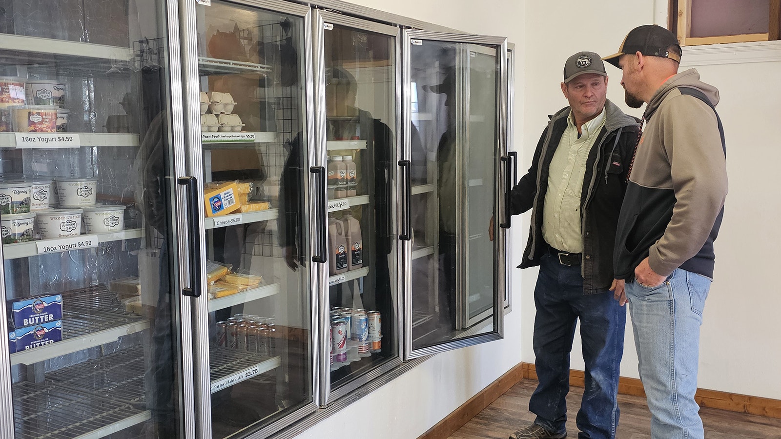 Jodi Shumway, left, and Jon Shumway, right, talk about Shumway Farms retail store, where they sell raw milk, as well as pasteurized chocolate milk, skyr, and ice cream.