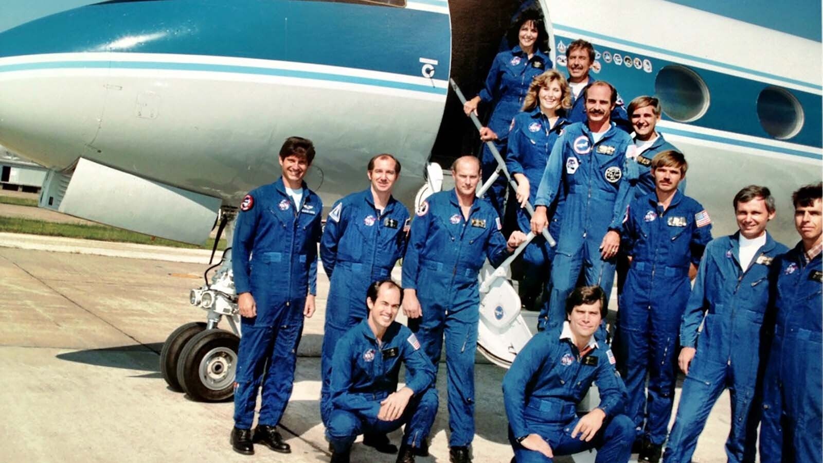 Crew from the 1985 space shuttle program. Larry LaRose is standing at the bottom of the stairs on the first step with some members of the STA Program flight crew.