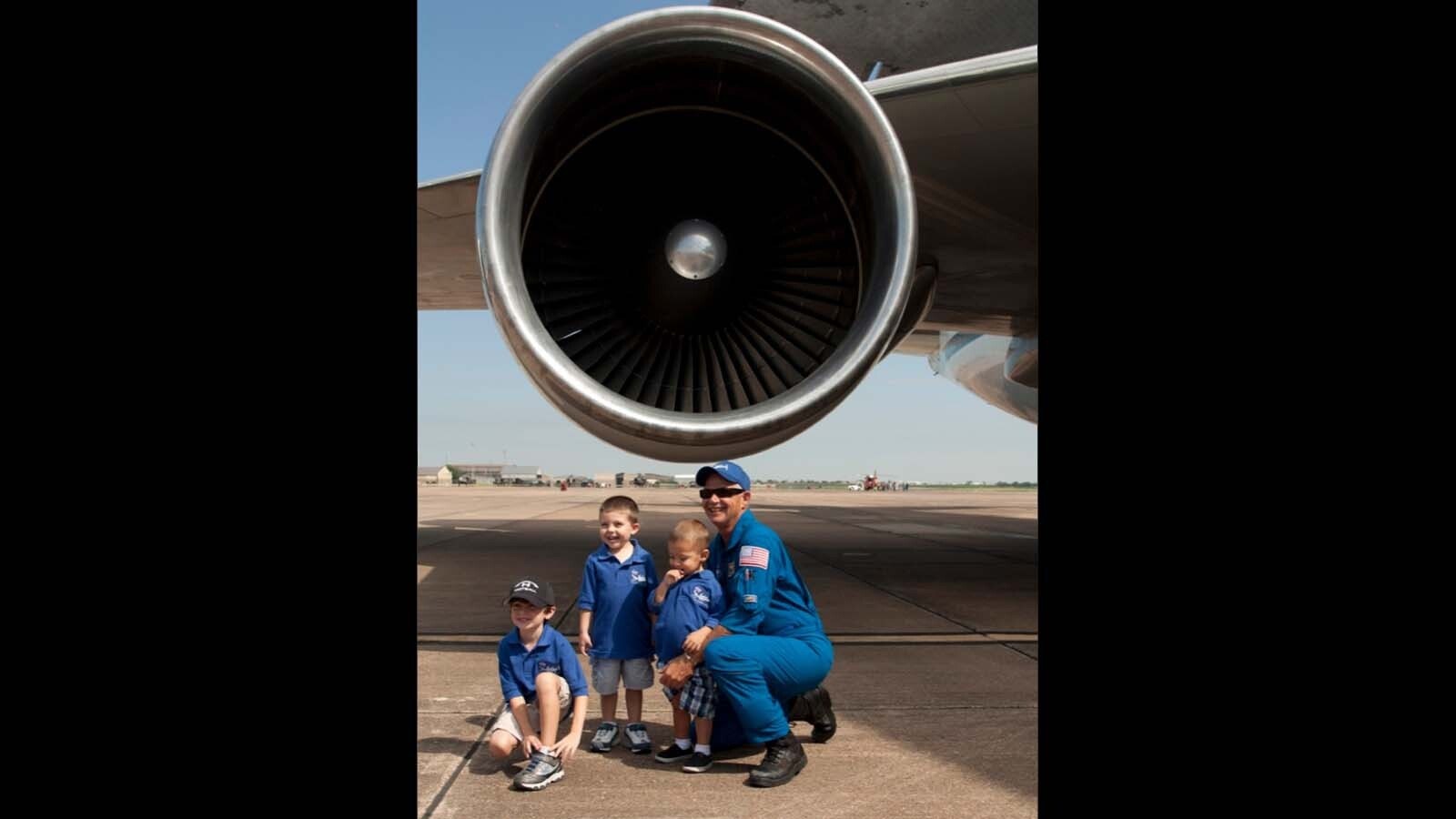 Larry LaRose at Ellington Field in Houston with grandsons Matt, Cody and Paco.