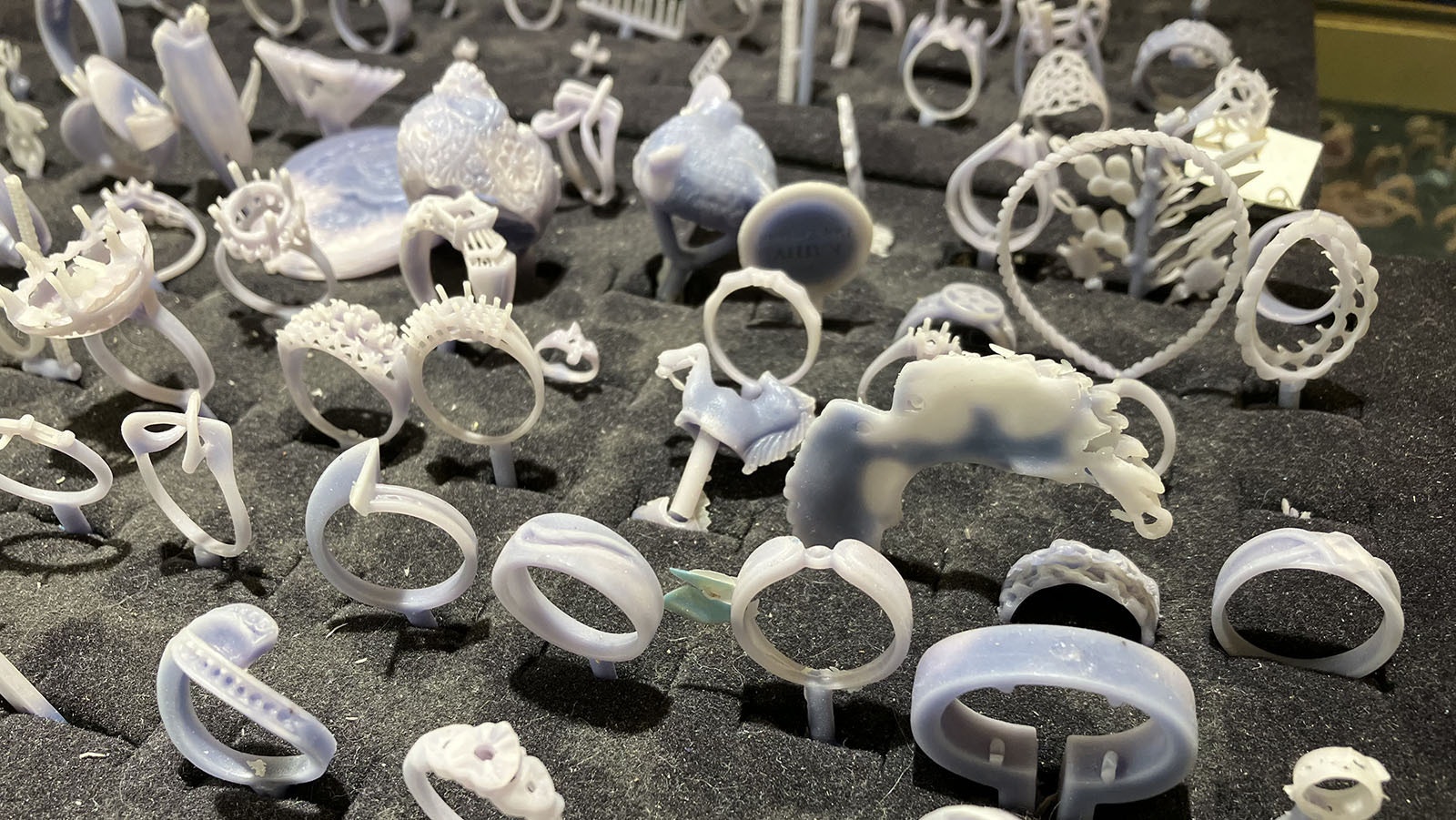 Wax rings, pendants, and ideas are on the counter at Sidadel Jewelers to give customers an idea of what is possible.