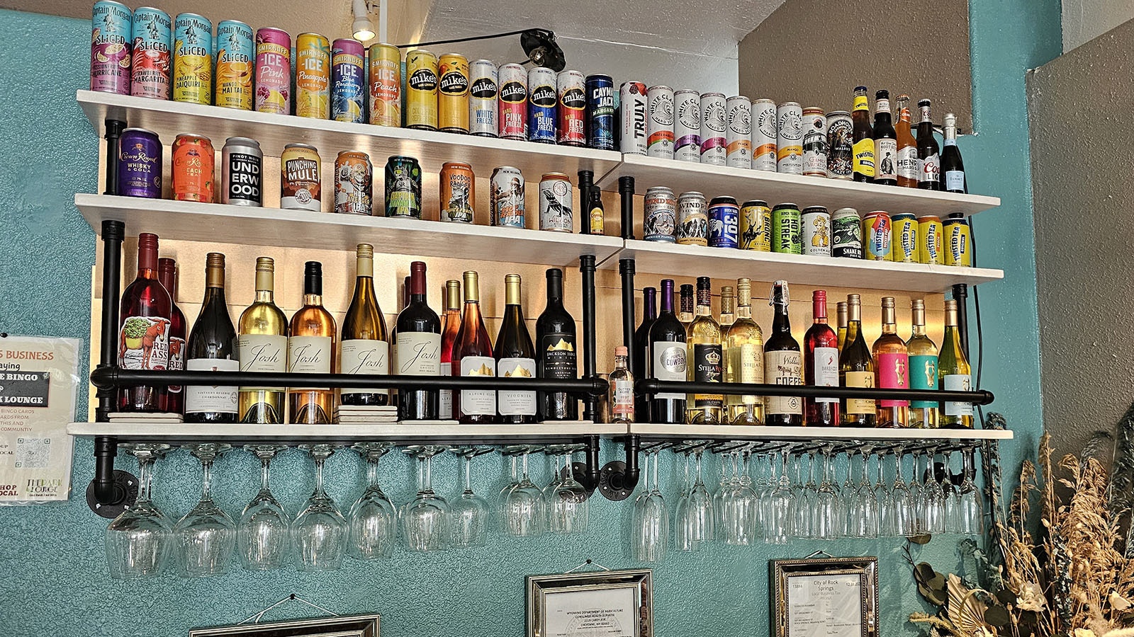 A selection of craft beer and wine available at Sidekicks Book-Bar.