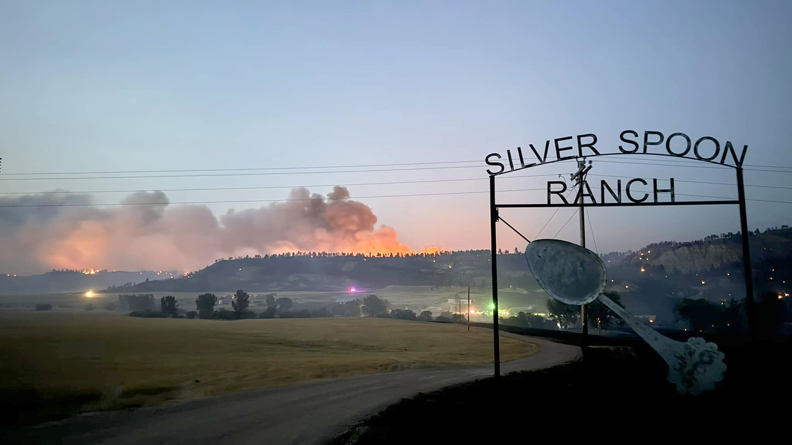 The Silver Spoon Fire burning in northeast Wyoming, as seen from the entrance to the Silver Spoon Ranch.