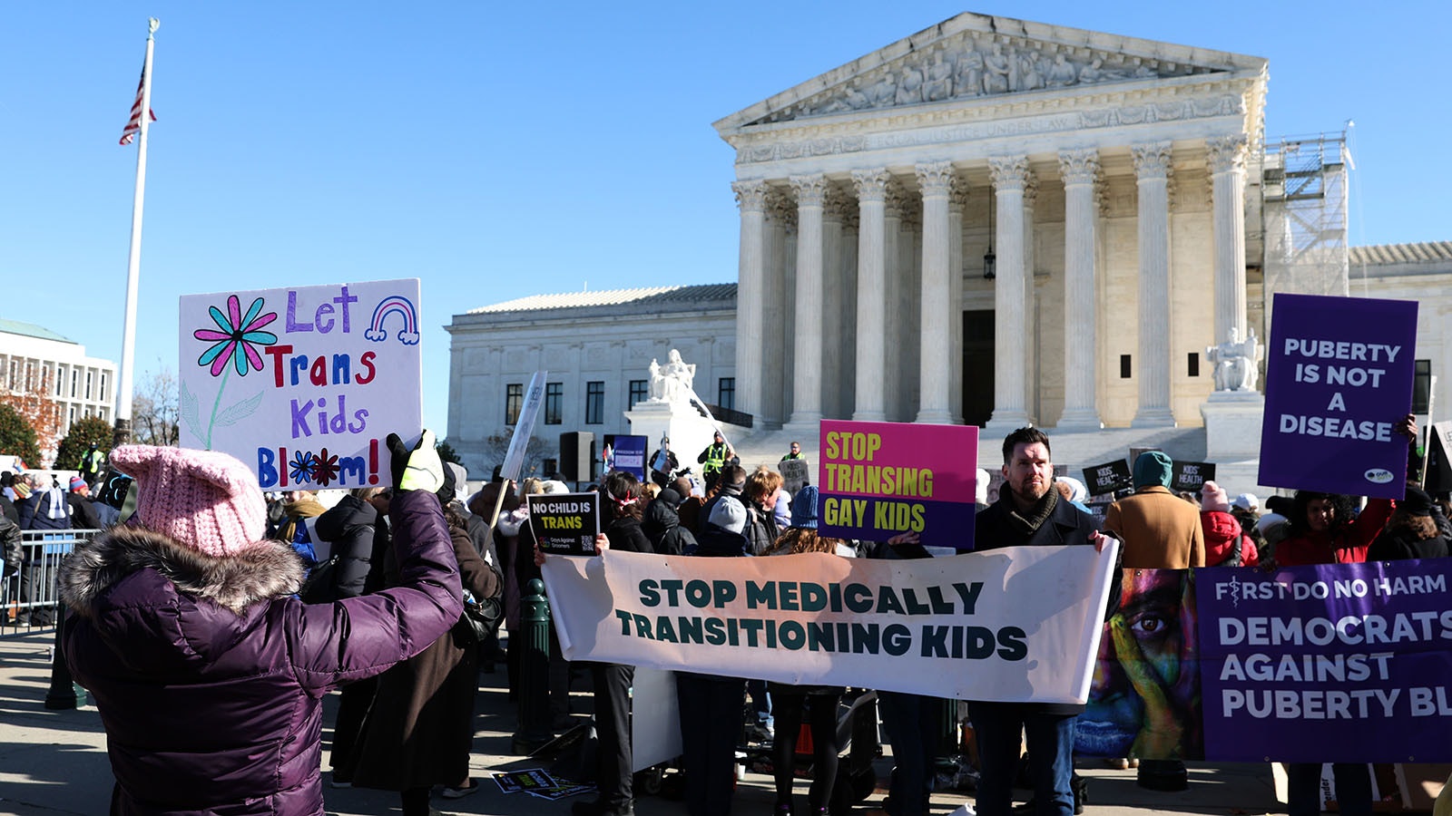 Opponents of allowing sex-change treatments for kids clash with transgender rights advocates outside the U.S. Supreme Court on Wednesday, Dec. 4, 2024, as the high court heard arguments in a case on transgender health rights.