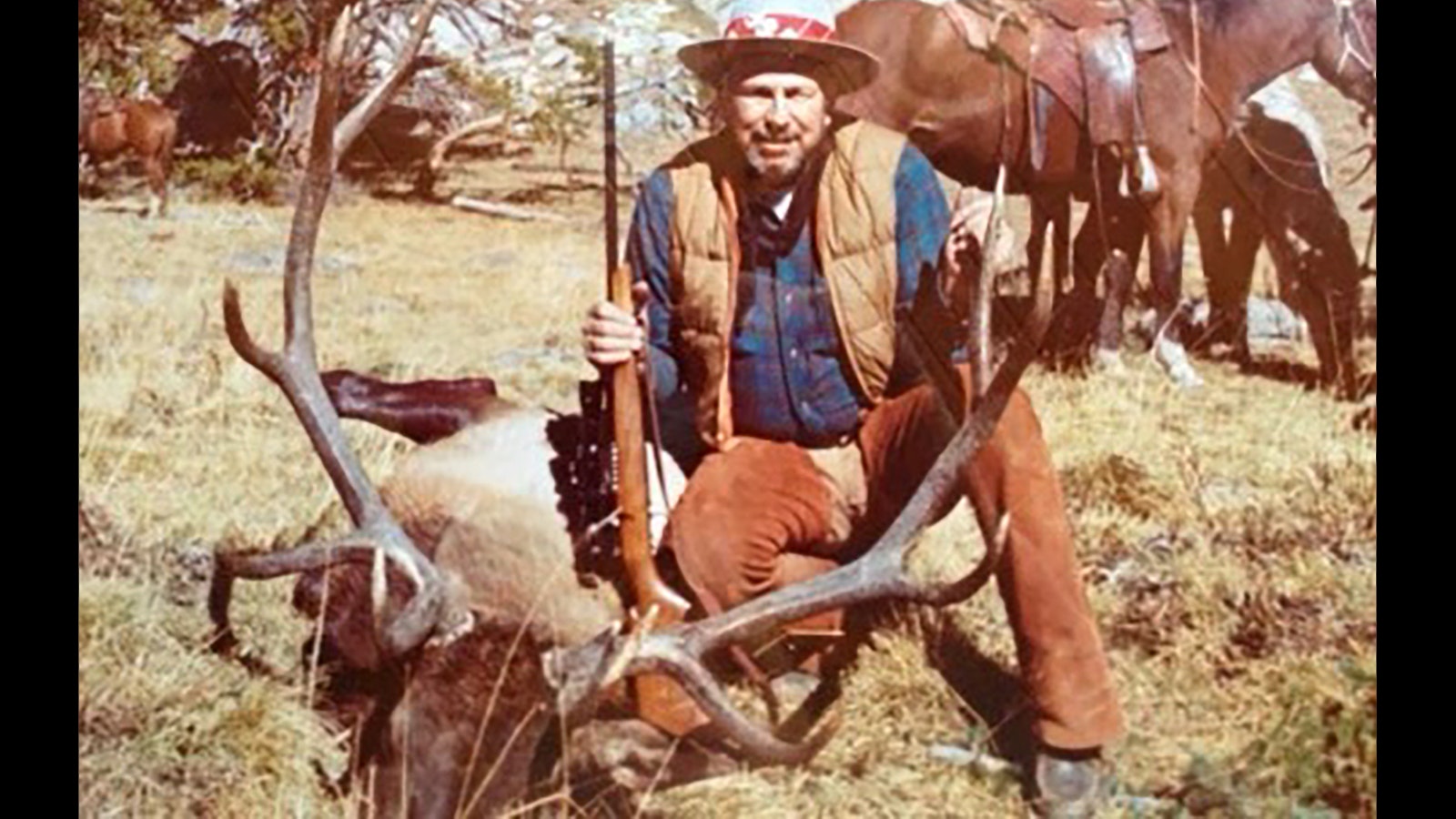Slim Pickens with a bull elk he shot in the Wind River Mountains.