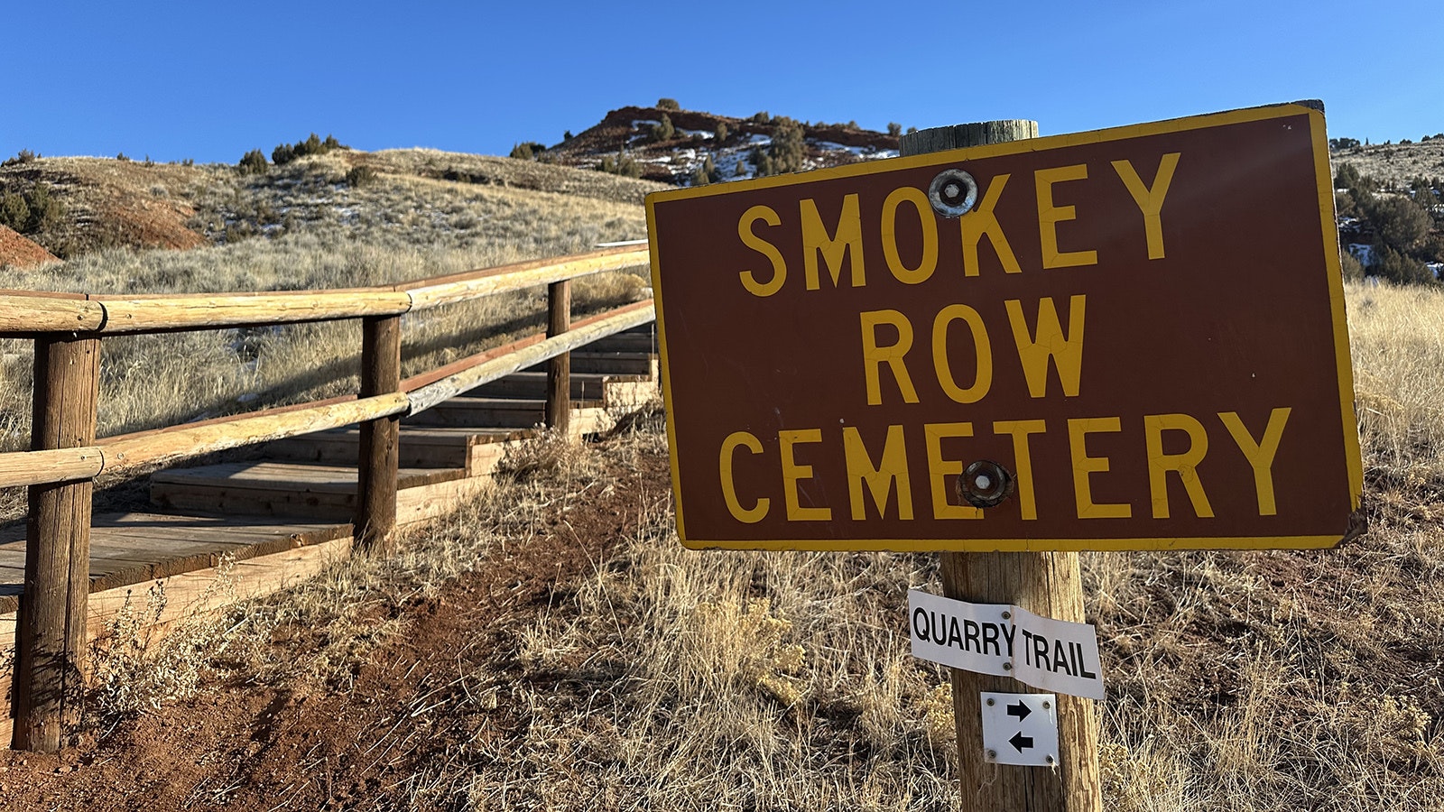 The Smokey Row Cemetery sign. Over the years, Smoky Row has been spelled Smokey or Smoky. Even the Hot Springs State Park lists it spelled both ways. Barb Tomes Vietti said that most newspapers in Wyoming in the 1890s spelled it Smoky Row so she said that is how the locals spell the name.