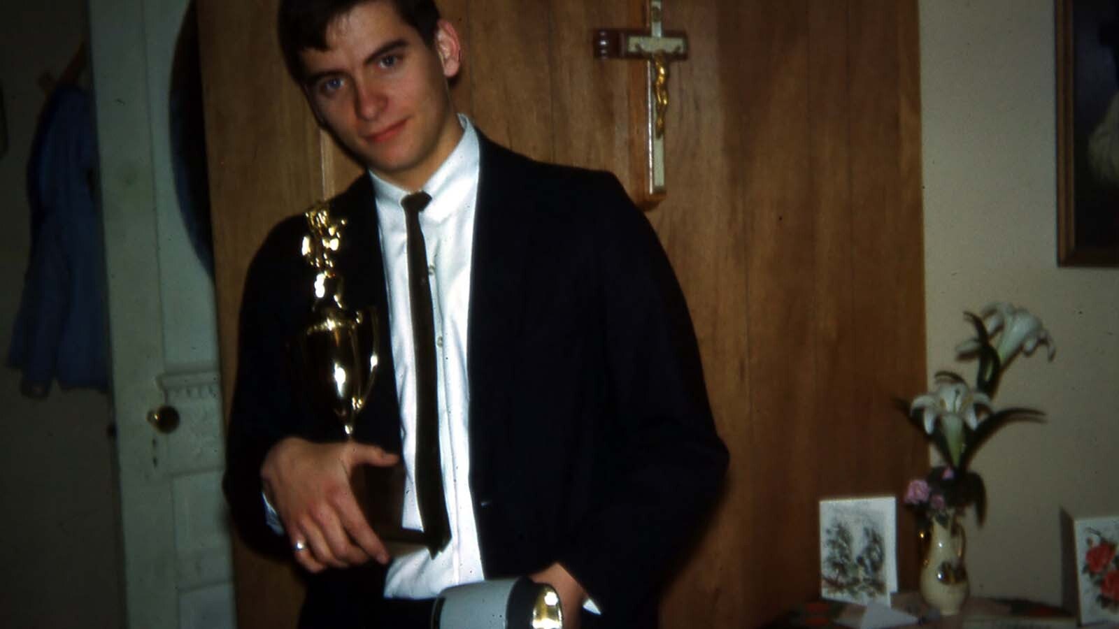 An 18-year-old Bill Sniffin with the trophy he got for producing the first-place news photo in a 1964 Iowa newspaper contest.