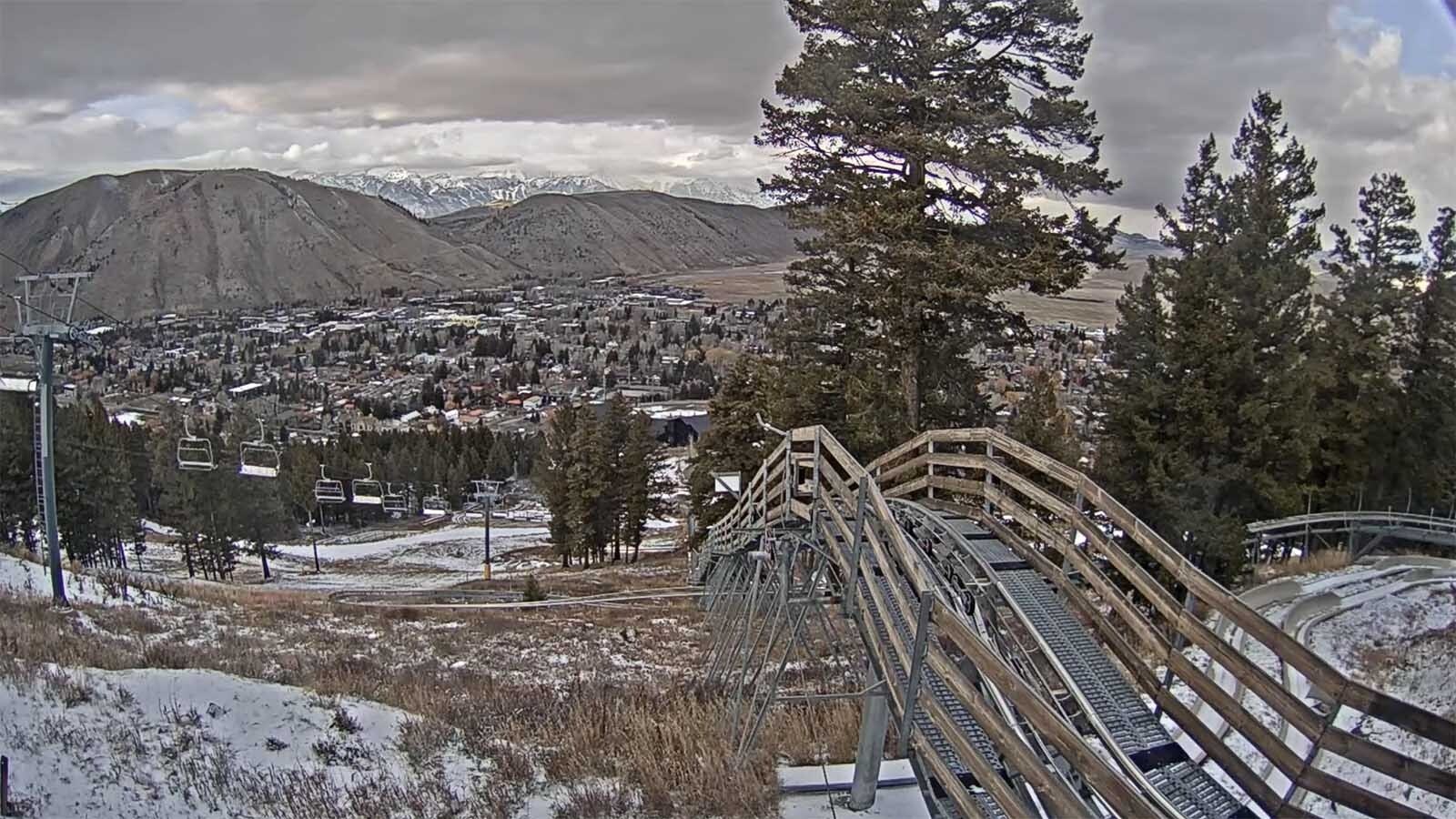 Northwest Wyoming ski resorts have had to postpone their scheduled openings because of a lack of snow. Above is a Wednesday webcam view from mid-mountain at Snow King resort.