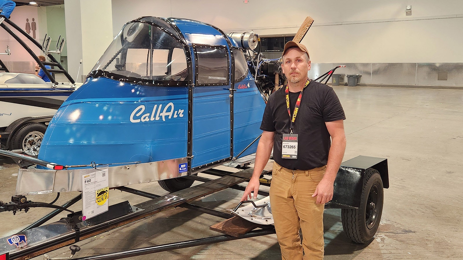 Ira Walker stands next to one of the CallAir snowplanes he acquired and restored. Walker is on a mission to chronicle the history of the Call Aircraft Company, which made single-engine monoplanes in addition to dozens of snowplanes for federal contracts.