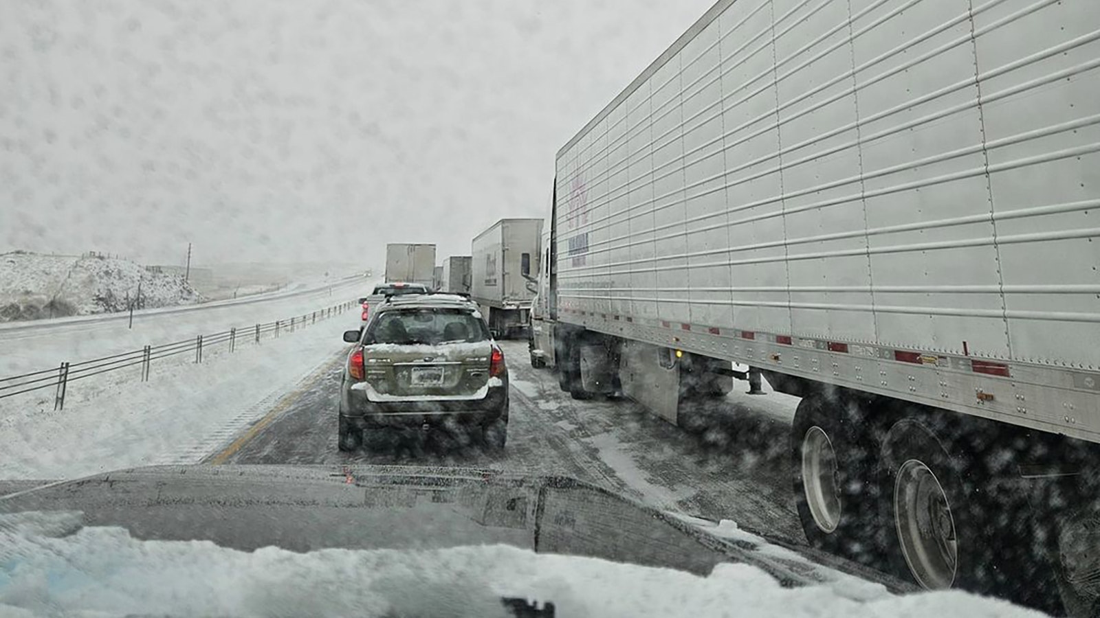 Traffic is at a standstill as the snow falls Thursday.
