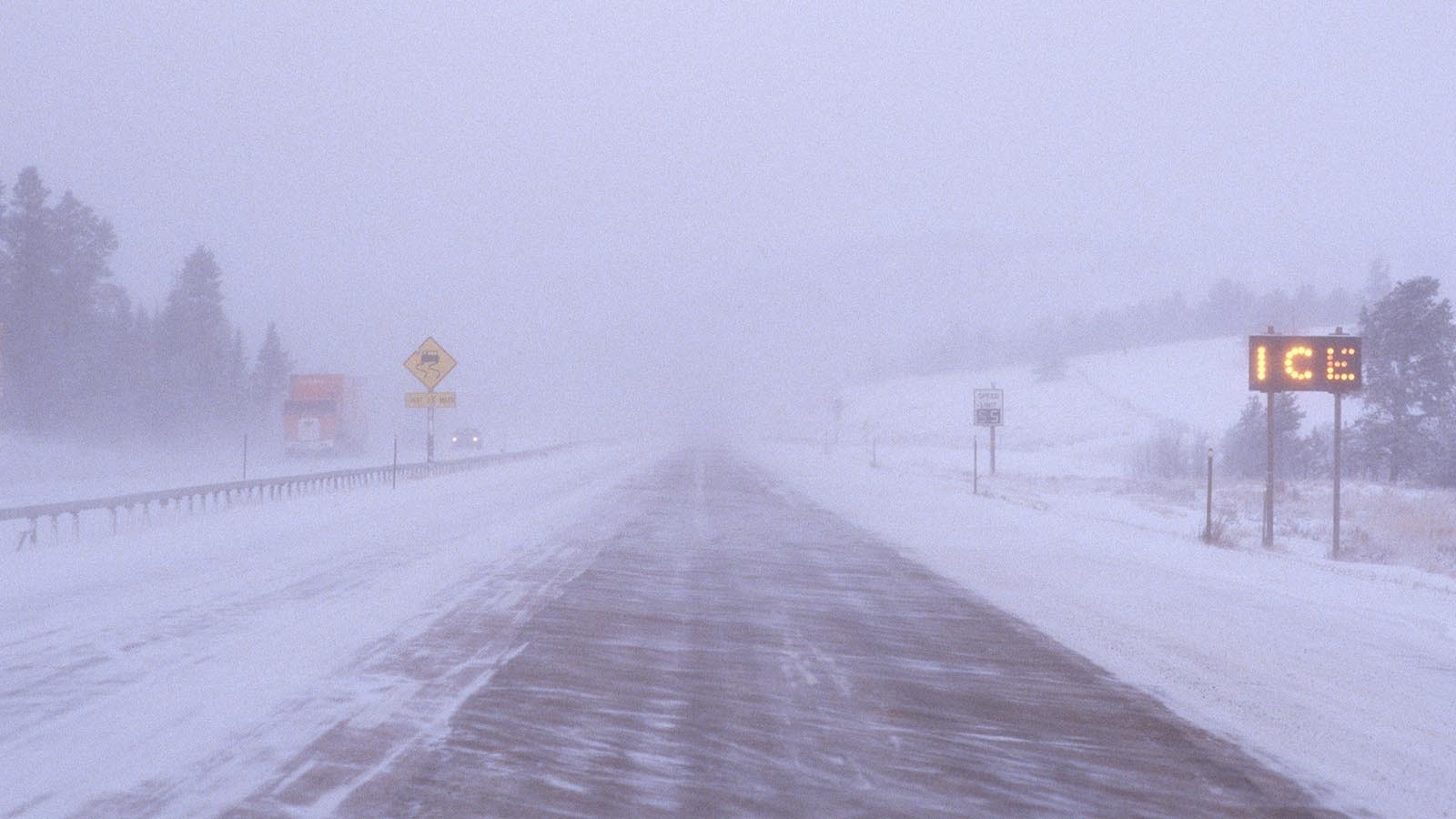 Between Friday and Tuesday, Wyomingites will experience the coldest temperatures of the winter season so far. Don Day says to expect dangerously low wind chills, black ice and wind-driven snow squalls. In this file photo, all three are happening along a Wyoming highway.