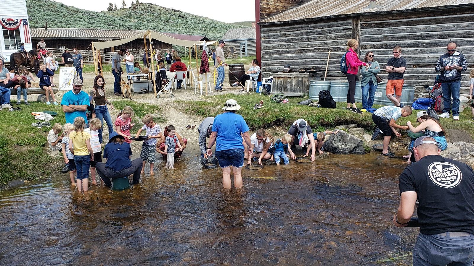 Children and adults gathered by the sides of Willow Creek recently during Gold Rush Days at South Pass City to try their hand at panning for gold.