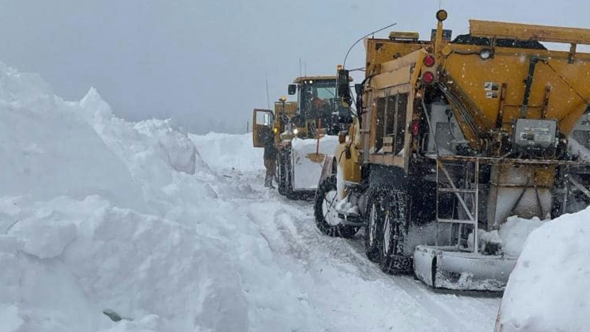 Wyoming Department of Transportation crews work to clear mountains of snow from South Pass this past winter.