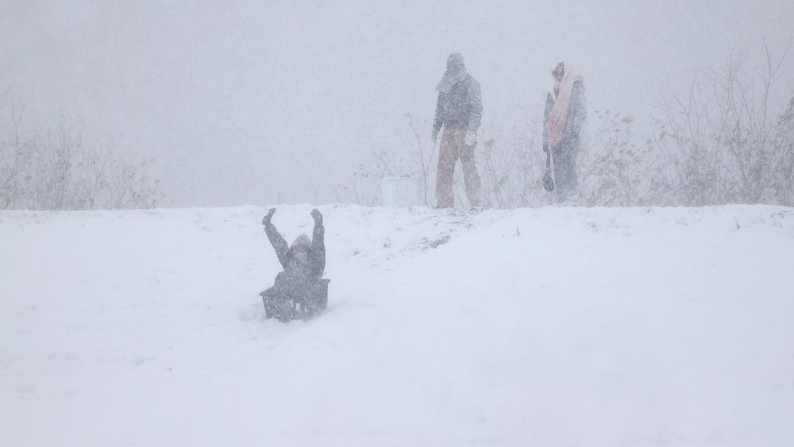 The levees along the Mississippi River became sledding hills during a snow storm Jan. 21, 2025, in New Orleans, Louisiana.