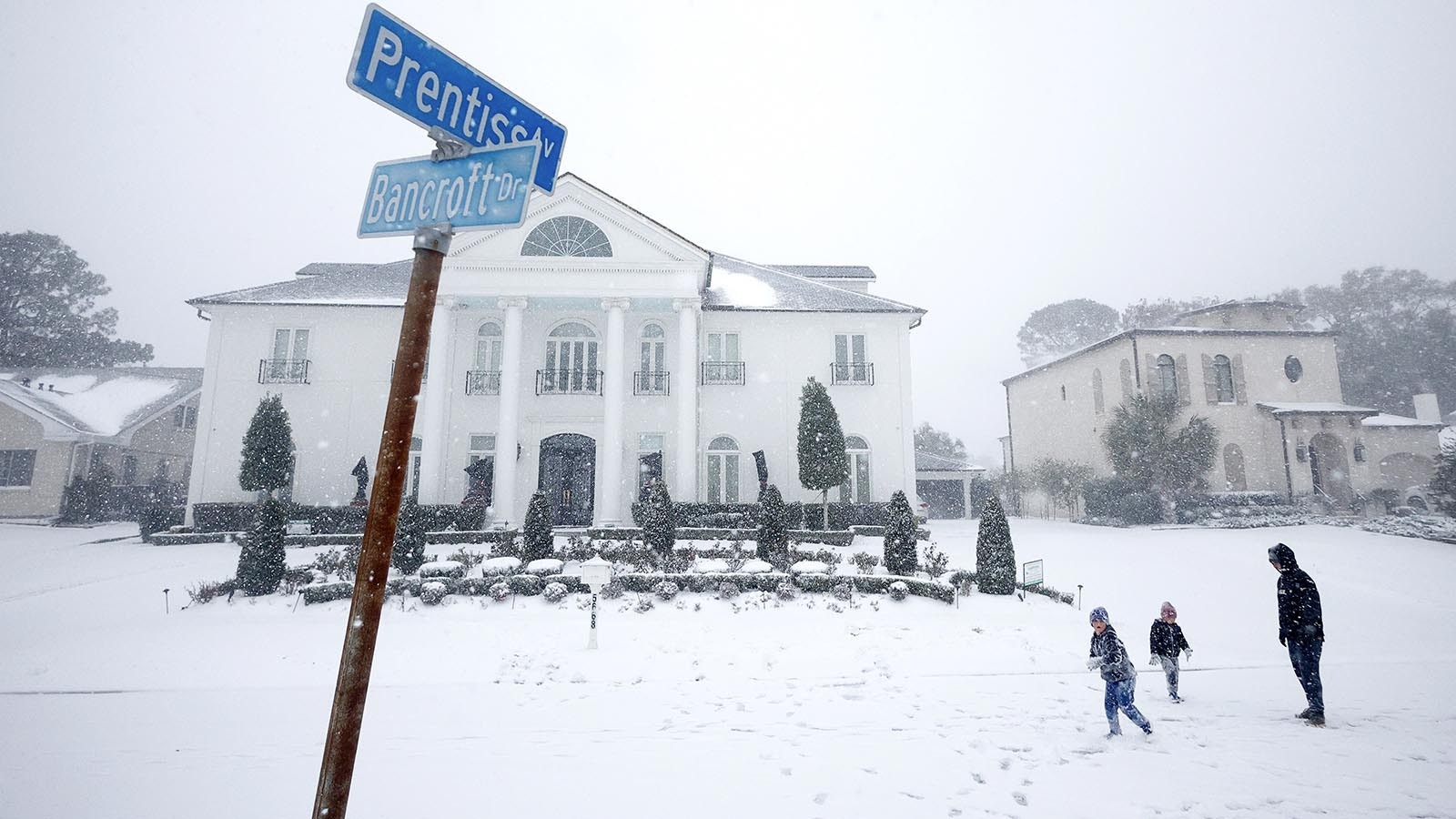 People play in the snow throughout the Gentilly neighborhood during Winter Storm Enzo on Jan. 21, 2025, in New Orleans, Louisiana. The city got as much as 10 inches of snow.