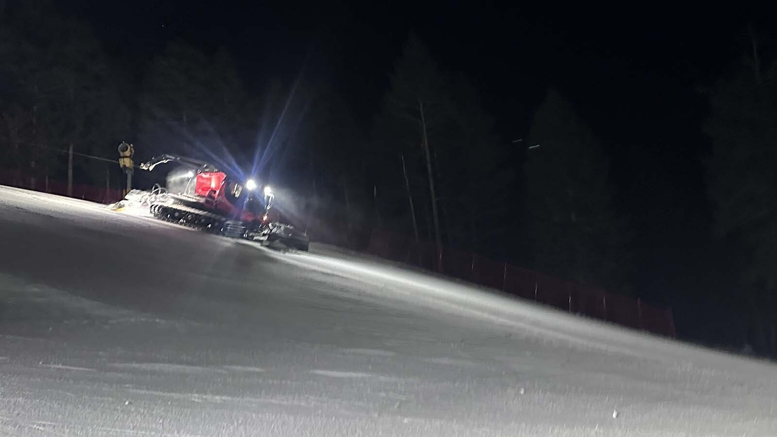 Brandon Wood, the master groomer at Snow King, specializes in building speed into the resort’s steep slopes — so steep, the snowcats sometimes tether with a winch.