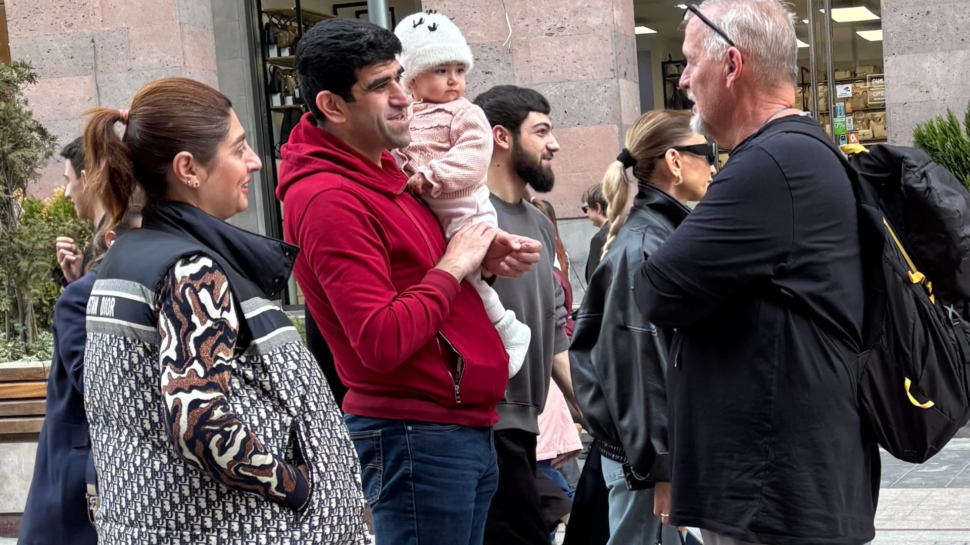 A team member of VBB sharing the Gospel to an Iranian family on the streets of Turkey
