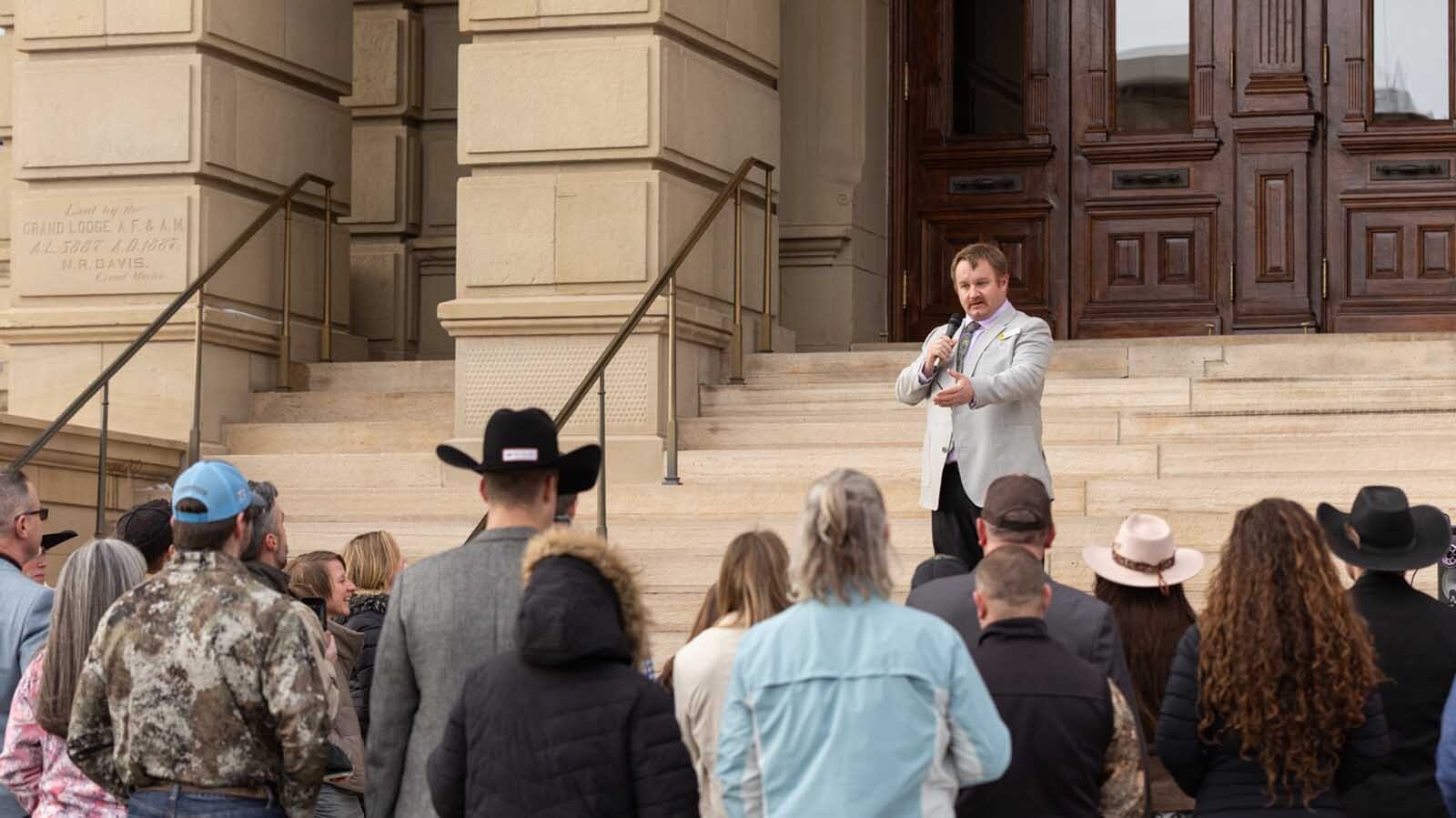 State Rep. Andrew Byron, R-Jackson, speaks during a rally at the state Capitol in Cheyenne on Thursday, Feb. 13, 2025.