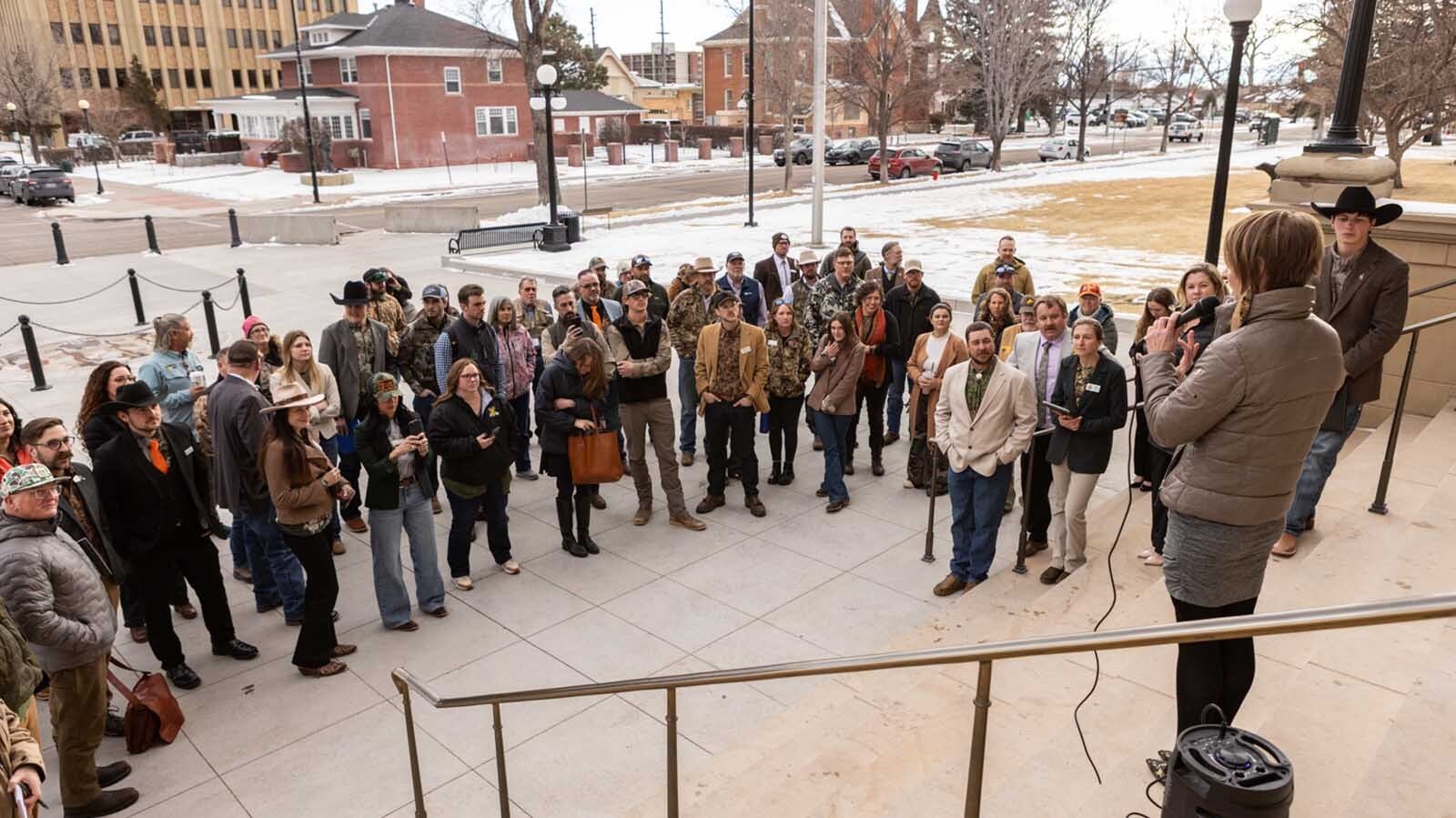 Sabrina King with the Wyoming chapter of Backcountry Hunters and Anglers speaks during a rally at the state Capitol in Cheyenne on Thursday, Feb. 13, 2025.