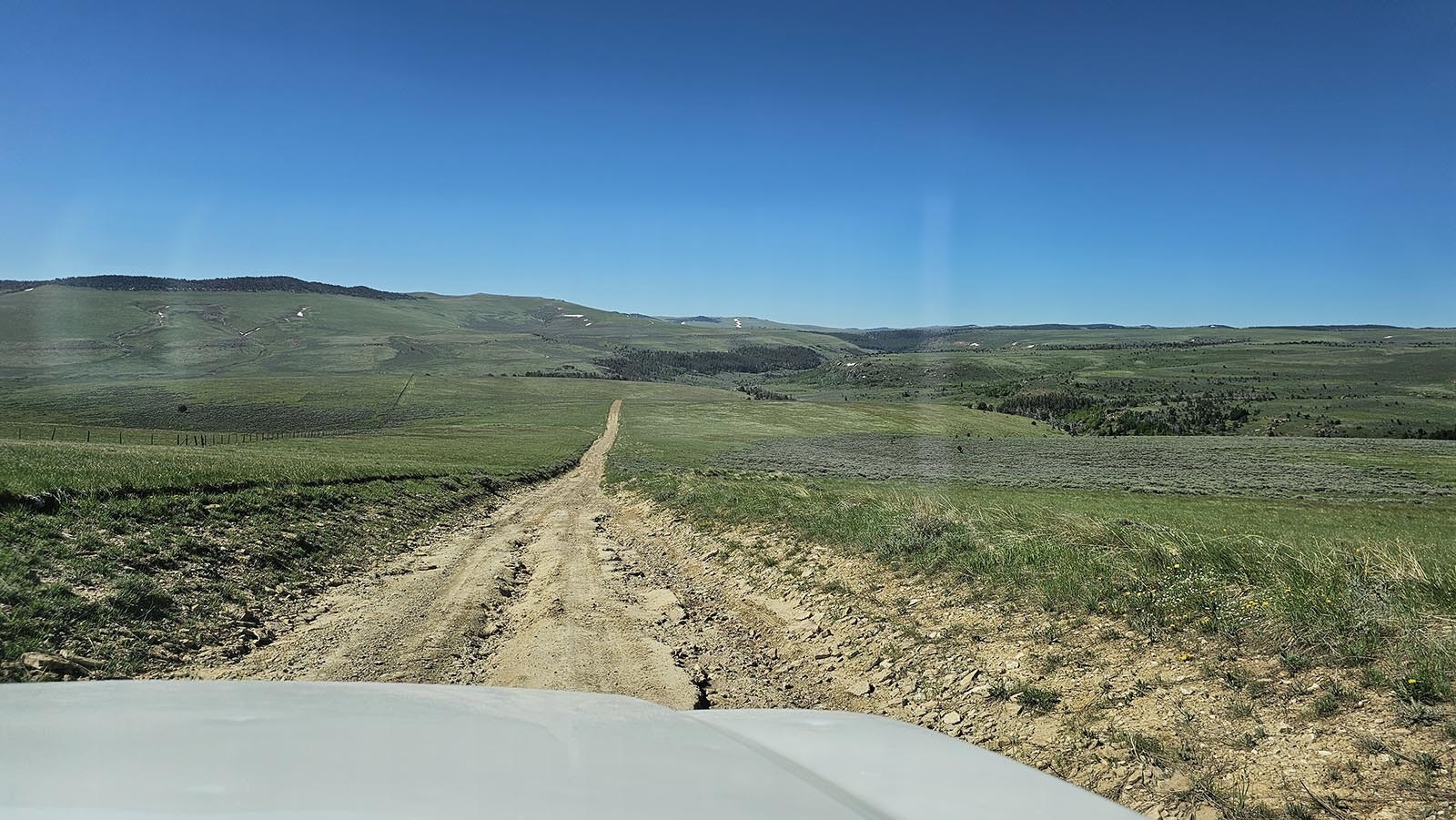 The "road" that takes people to the Hole in the Wall is at times little more than a dry creek bed, eventually dwindling down to a two track that has tufts of grass standing nearly as tall as the truck's hood.