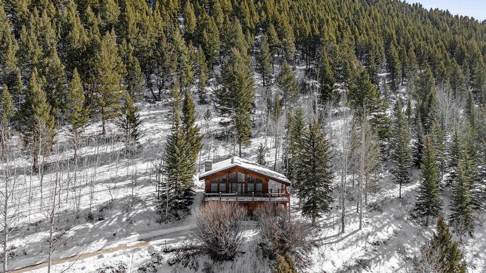 Two adjacent 40-acre lots in Jackson Hole’s elite Spring Gulch area are headed to auction for $21.4 million. They're marketed mainly for their rare views and wildlife neighbors rather than the homes already on them.