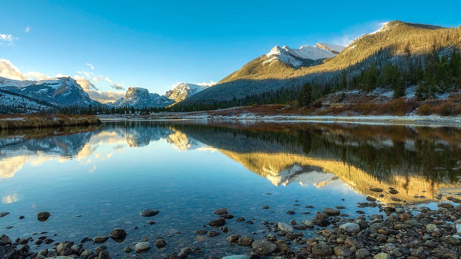 The view looking down the Green River to Squaretop Mountain in western Wyoming is one of the state’s most recognizable landmarks, even being on the license plate. Now the Dollar Lake Fire is threatening to change that.