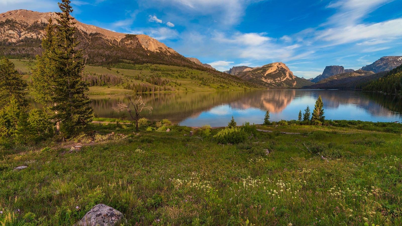 The view looking down the Green River to Squaretop Mountain in western Wyoming is one of the state’s most recognizable landmarks, even being on the license plate. Now the Dollar Lake Fire is threatening to change that.