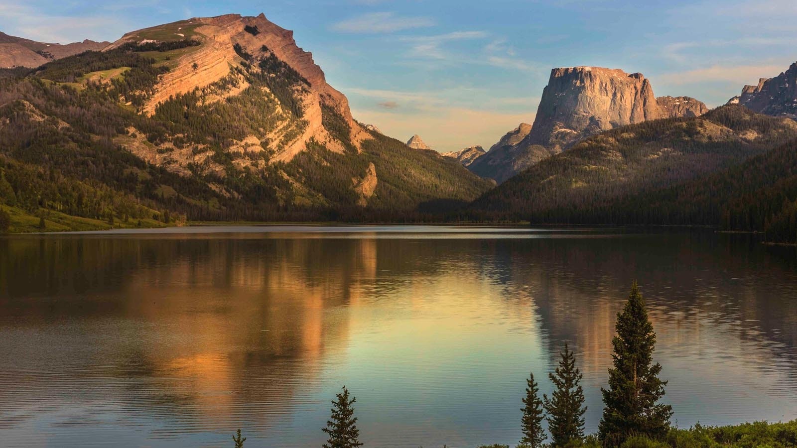 The view looking down the Green River to Squaretop Mountain in western Wyoming is one of the state’s most recognizable landmarks, even being on the license plate. Now the Dollar Lake Fire is threatening to change that.