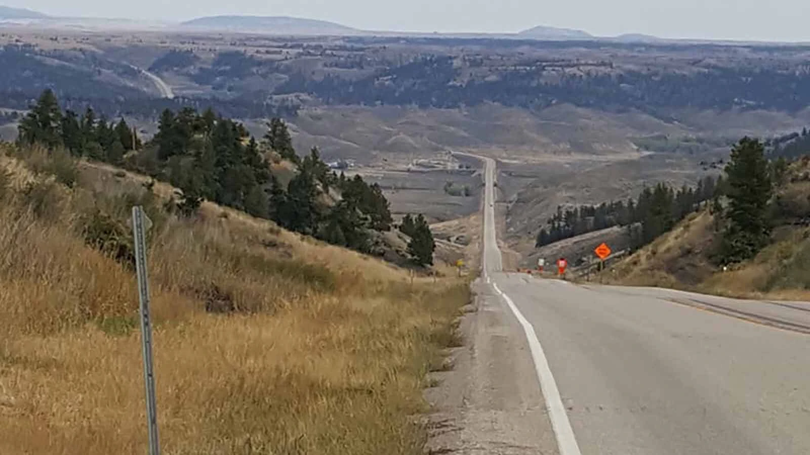 A remote stretch of highway in rural Montana where multiple women have reported being stalked and harassed by a white pickup with dark windows.
