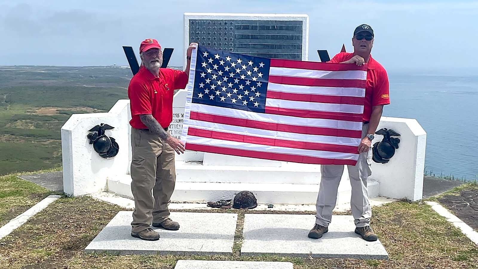 Dan Starks, left, and Iwo Jima Association Executive Director Shayne Jarosz at the memorial to the flag raising on the island earlier in 2025. Starks got a rare opportunity to visit Iwo Jima 80 years after his father fought in the World War II battle.