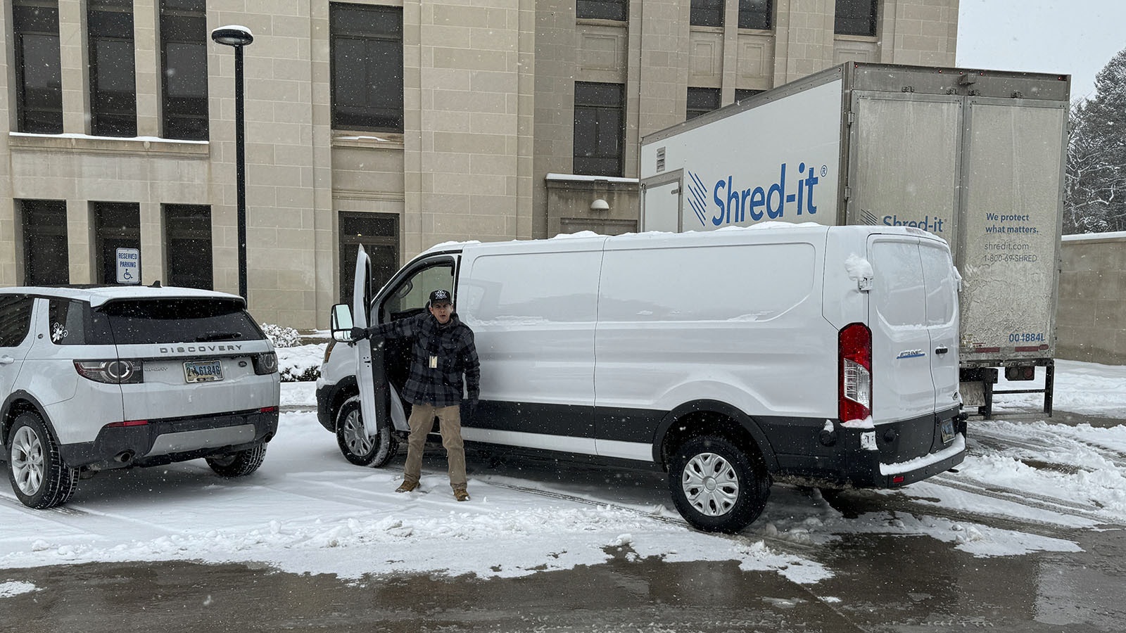 Danny Barela delivers mail to state government workers in freezing temperatures and snow in one of Wyoming’s two electric-powered cargo vans.