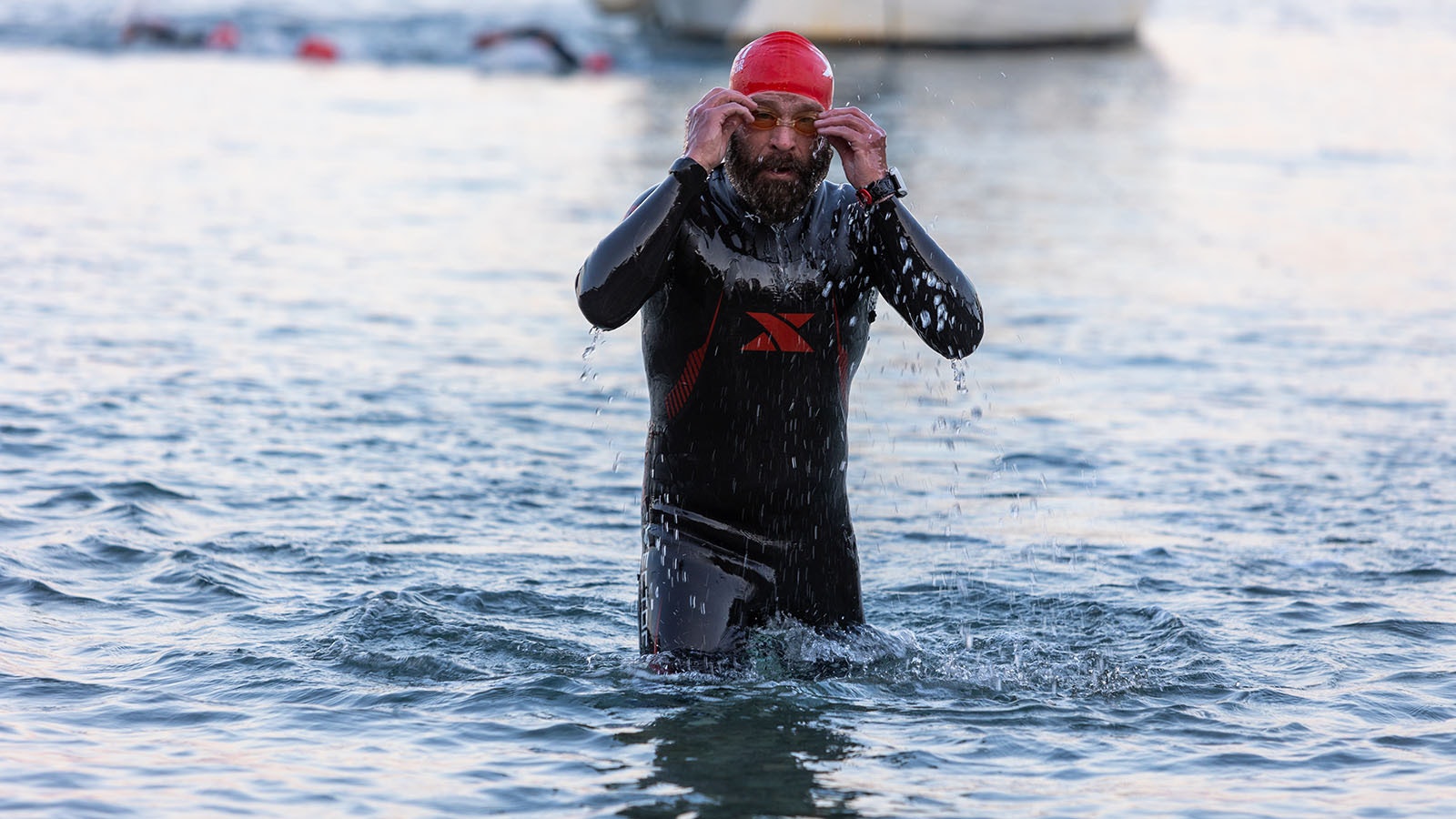 Steve Bang finishes the swim part of the triathlon in the Adriatic Sea.